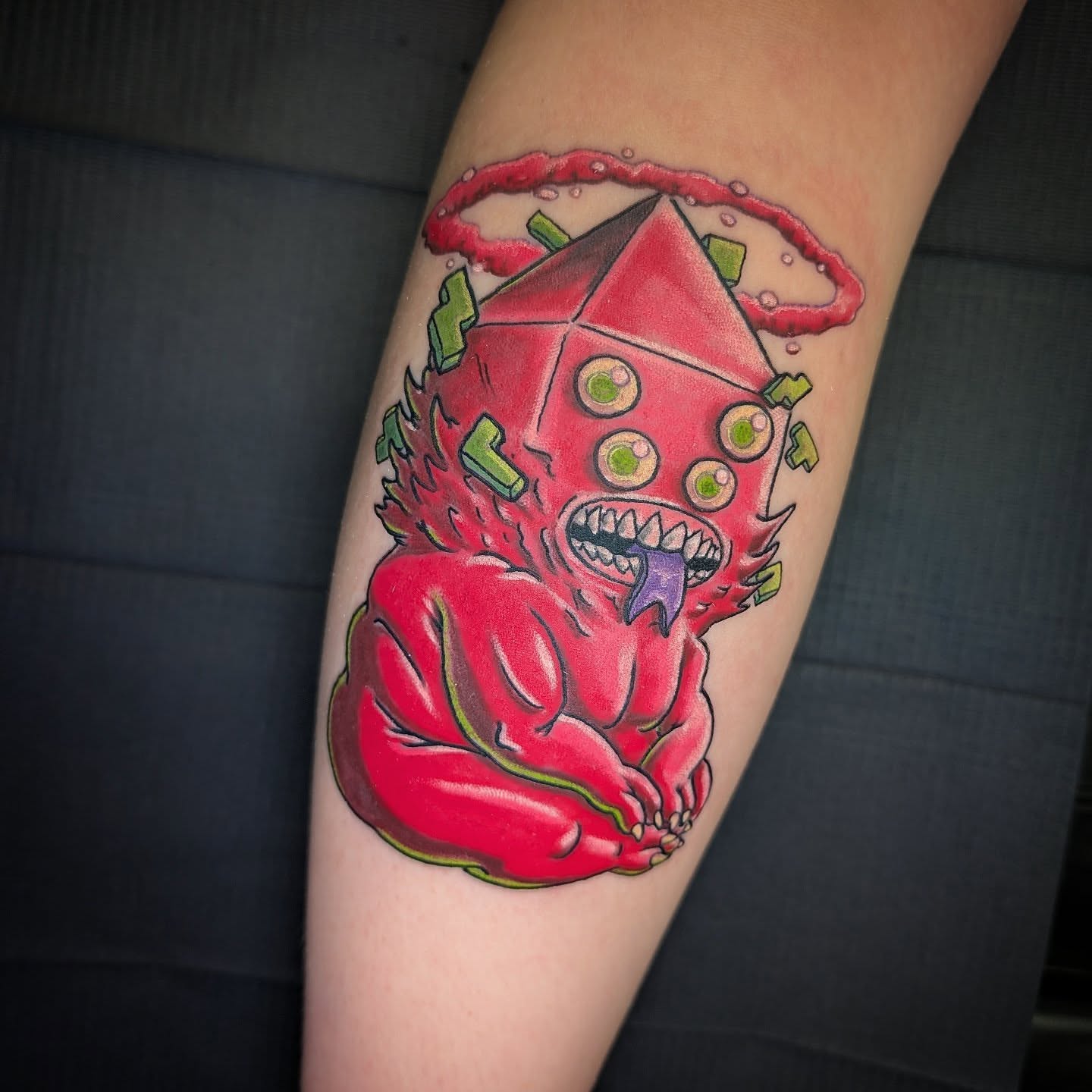 Demon with dice American traditional tattoo on the forearm by Will Alexander, Lombard, Illinois