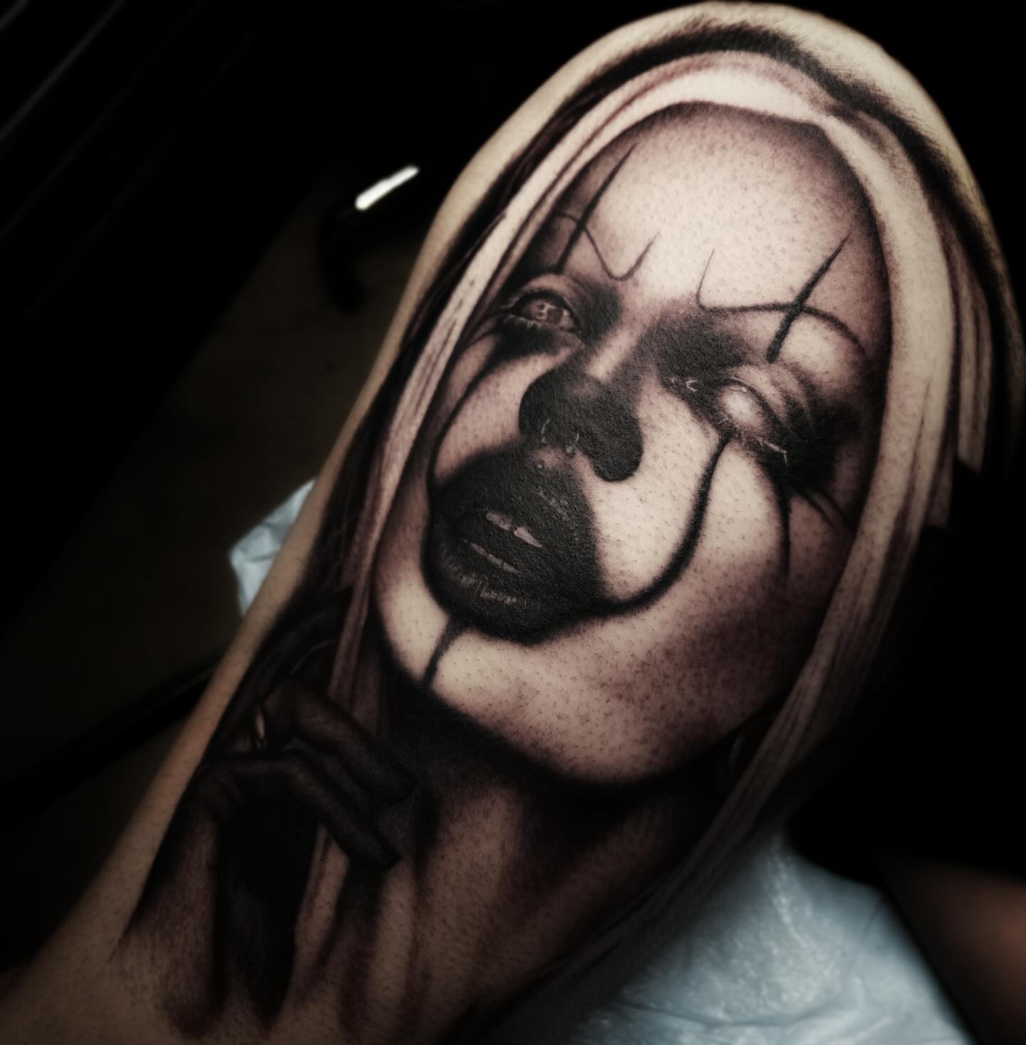 Clown face realism tattoo on the forearm by 𝖎 𝖆𝖒 𝖗𝖔𝖙𝖙𝖎𝖓𝖌 𝖜𝖎𝖙𝖍 𝖞𝖔𝖚