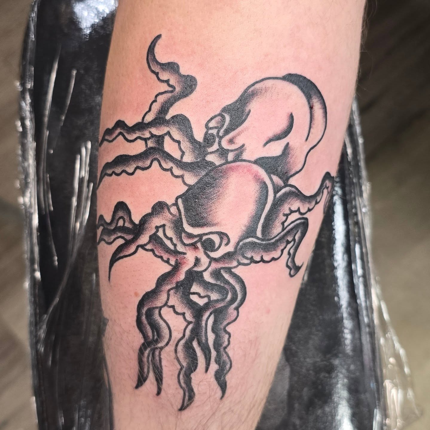 Octopus black and grey tattoo on the forearm by Columbus tattoo artist