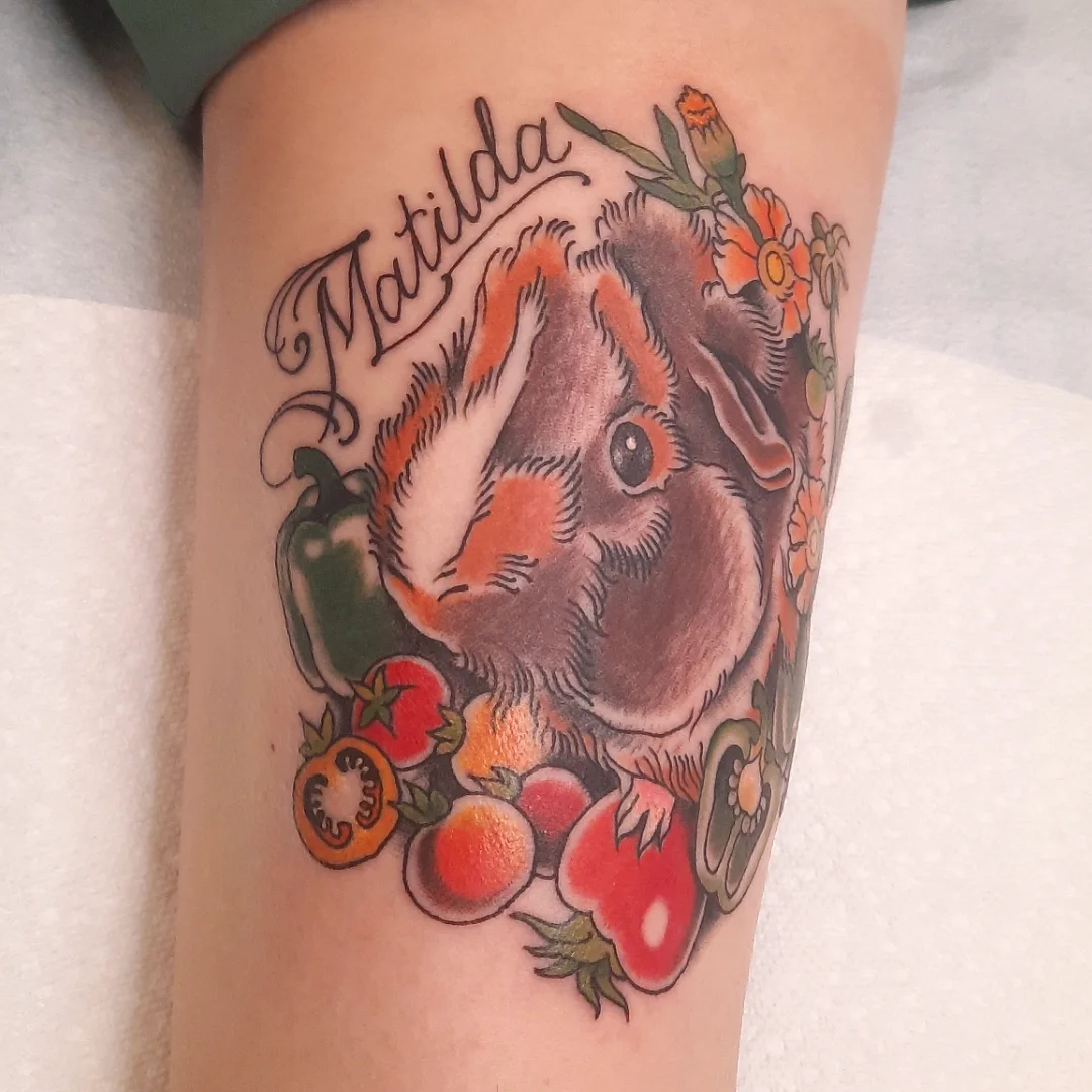 Guinea pig and vegetables American traditional tattoo on the forearm by Kaetlyn