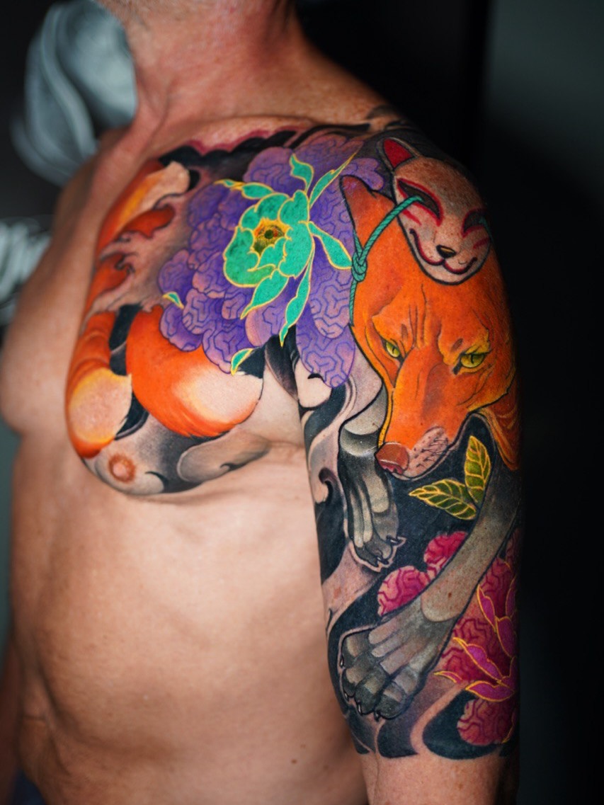 Fox and flowers japanese irezumi tattoo on the upper arm by Grego Hernandez, Miami, Florida
