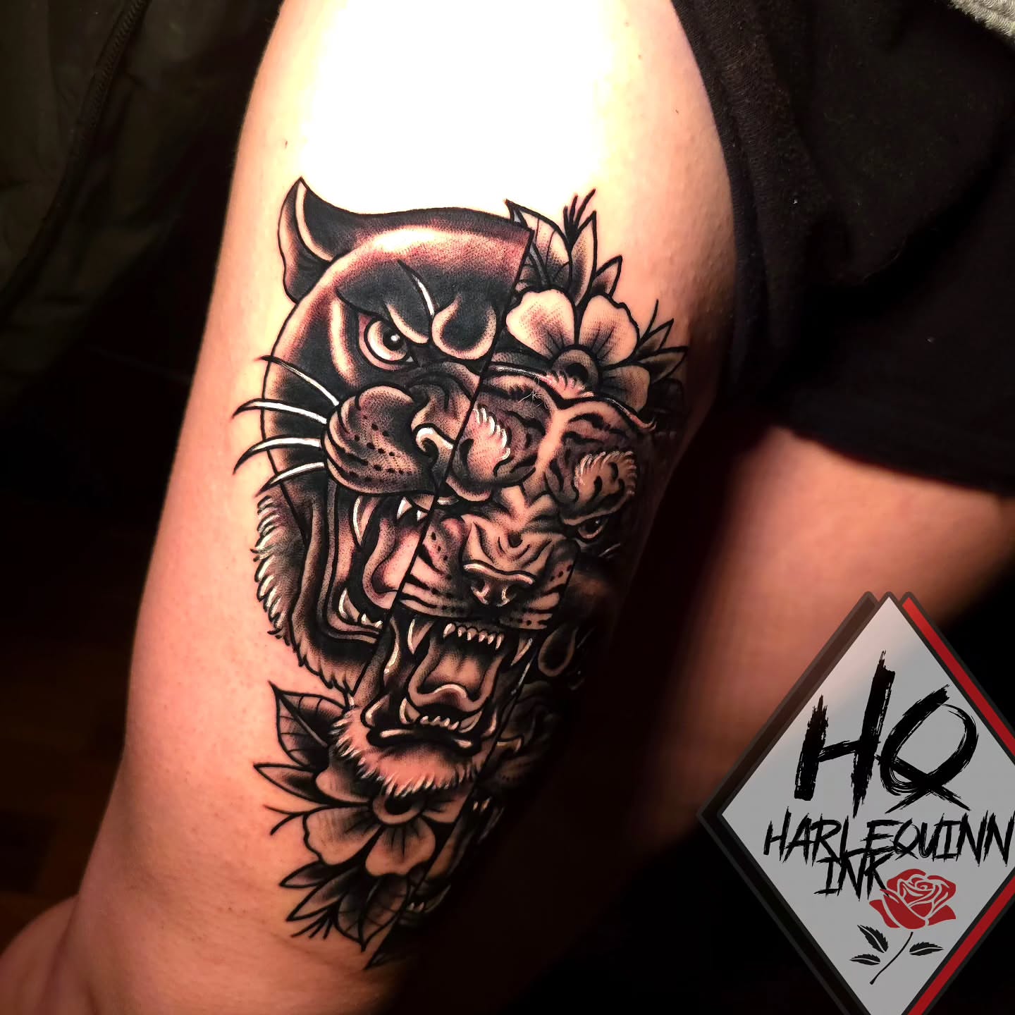 Panther with flowers American traditional tattoo on the forearm by HarleQuinn_Ink