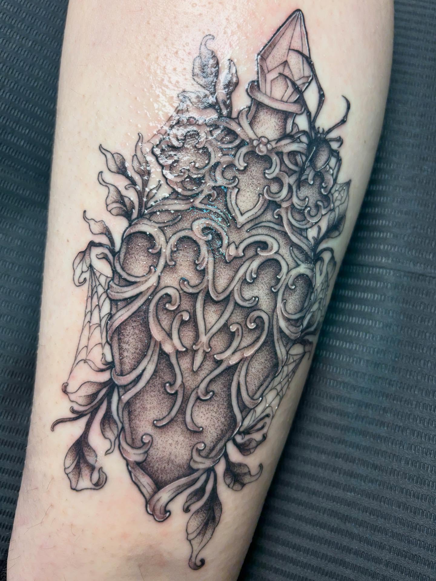 Ornate heart ornamental tattoo on the forearm by Rachel Foster