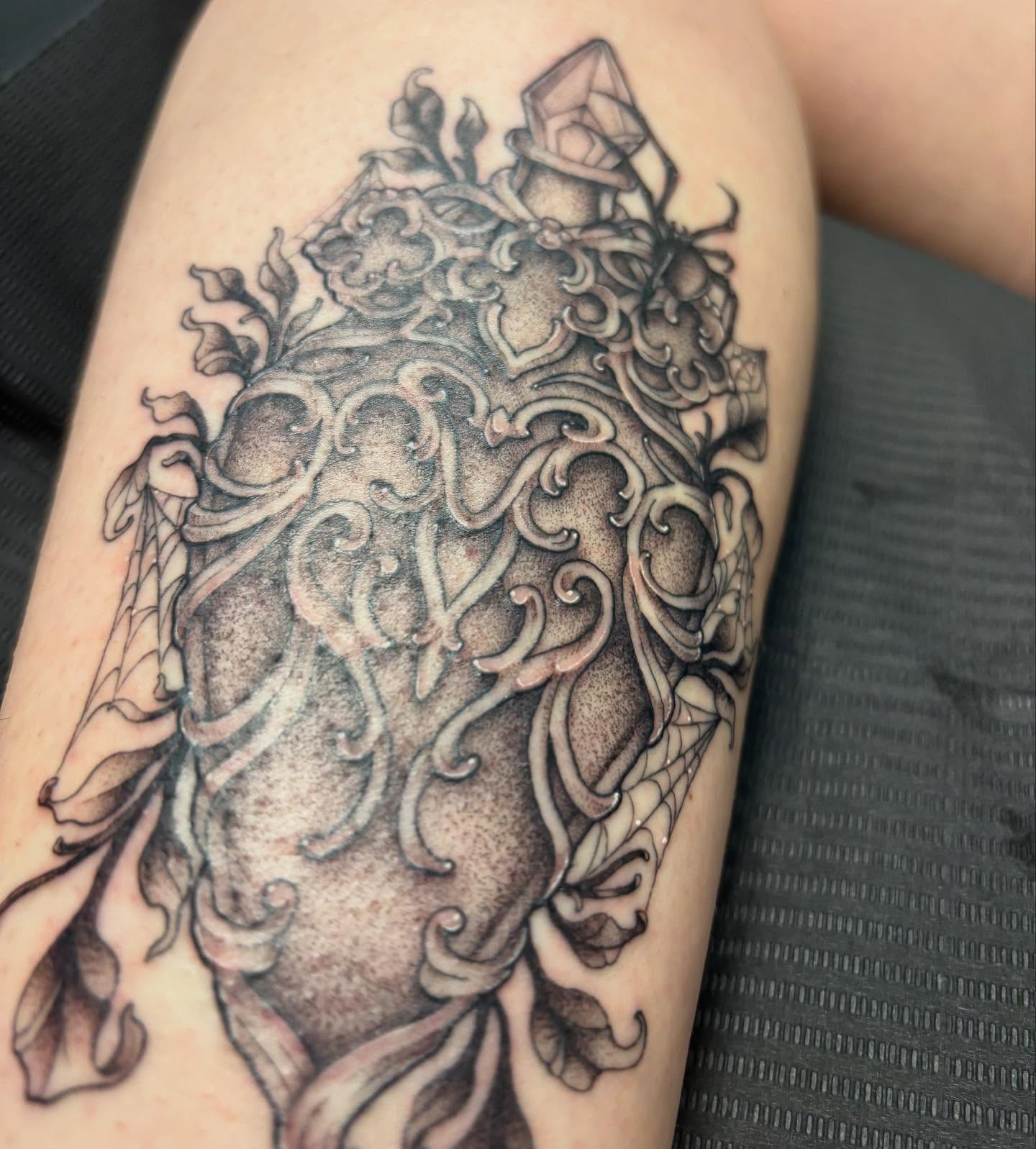 Heart with intricate patterns ornamental tattoo on the forearm by Rachel Foster