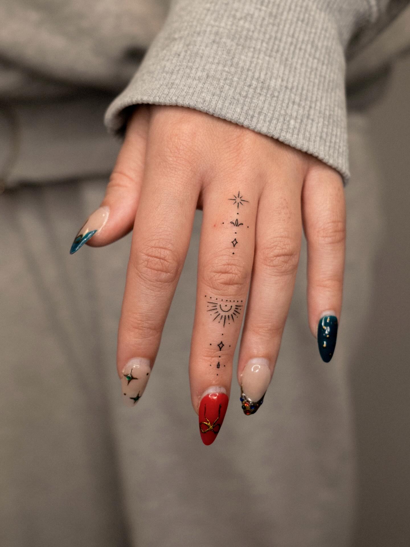 Sun and geometric patterns dotwork tattoo on the hand by ๐๐๐ฆ ๐๐ ๐ฎ๐ฒ๐๐ง