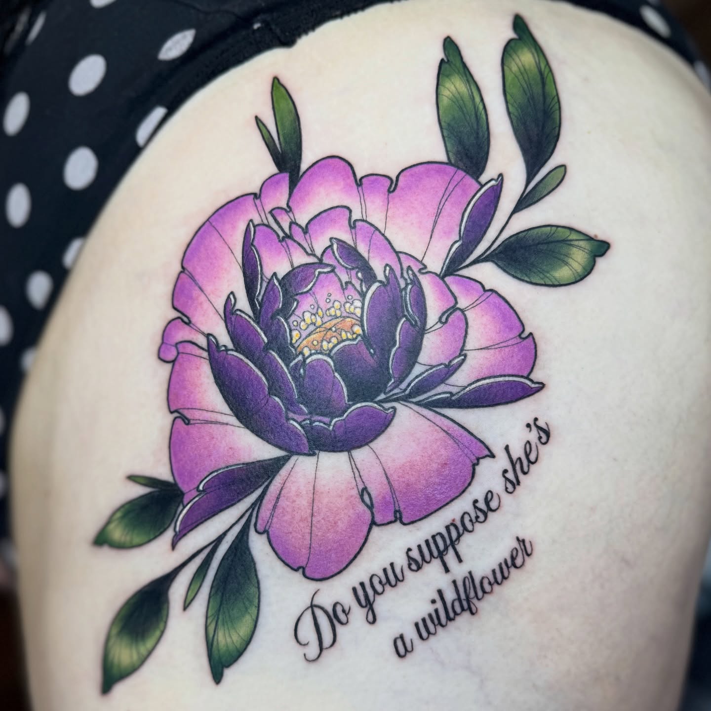 Purple flower American traditional tattoo on the shoulder by Erin Bratzler
