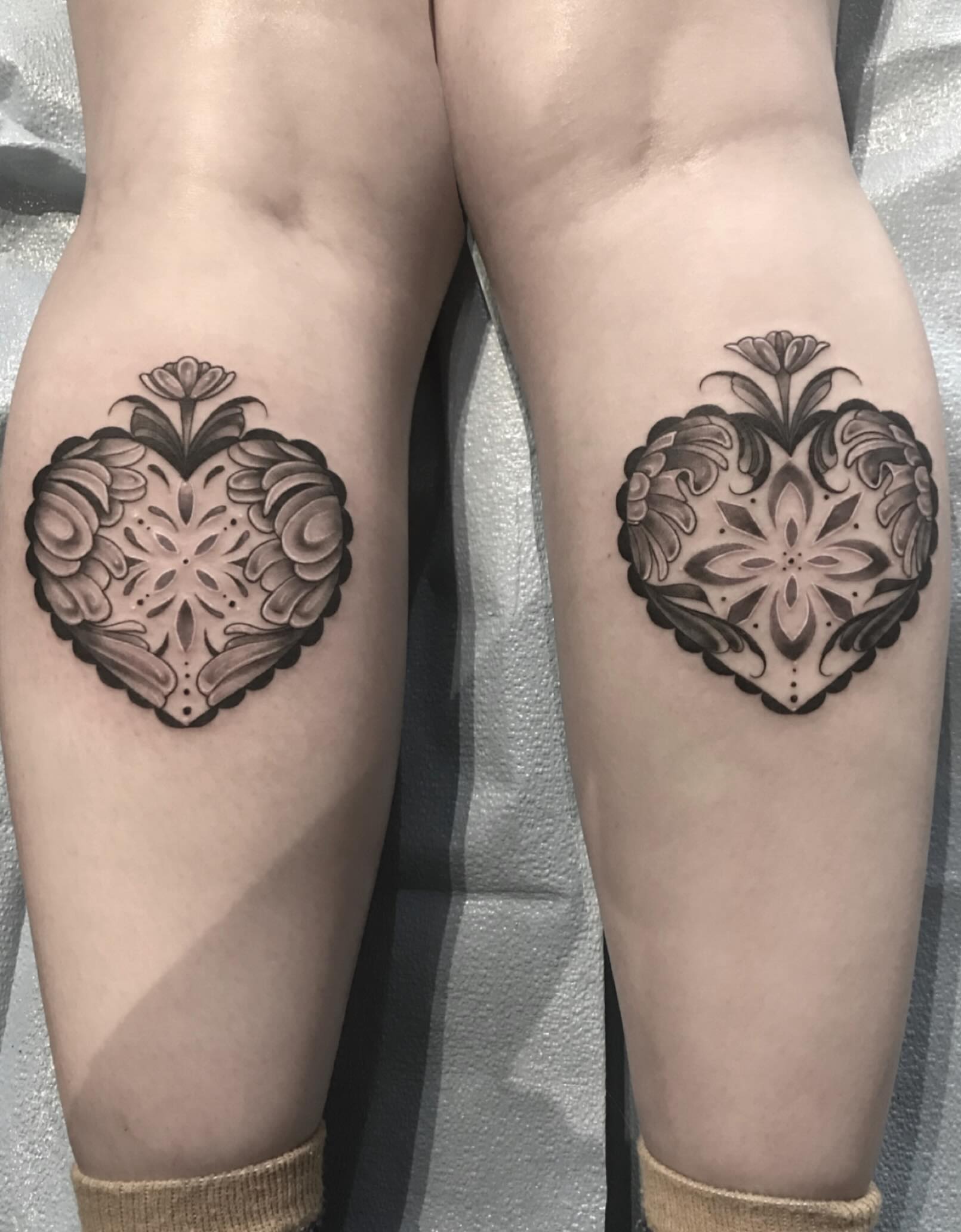 Floral heart ornamental tattoo on the calf by Heather Syvilla Tattoos