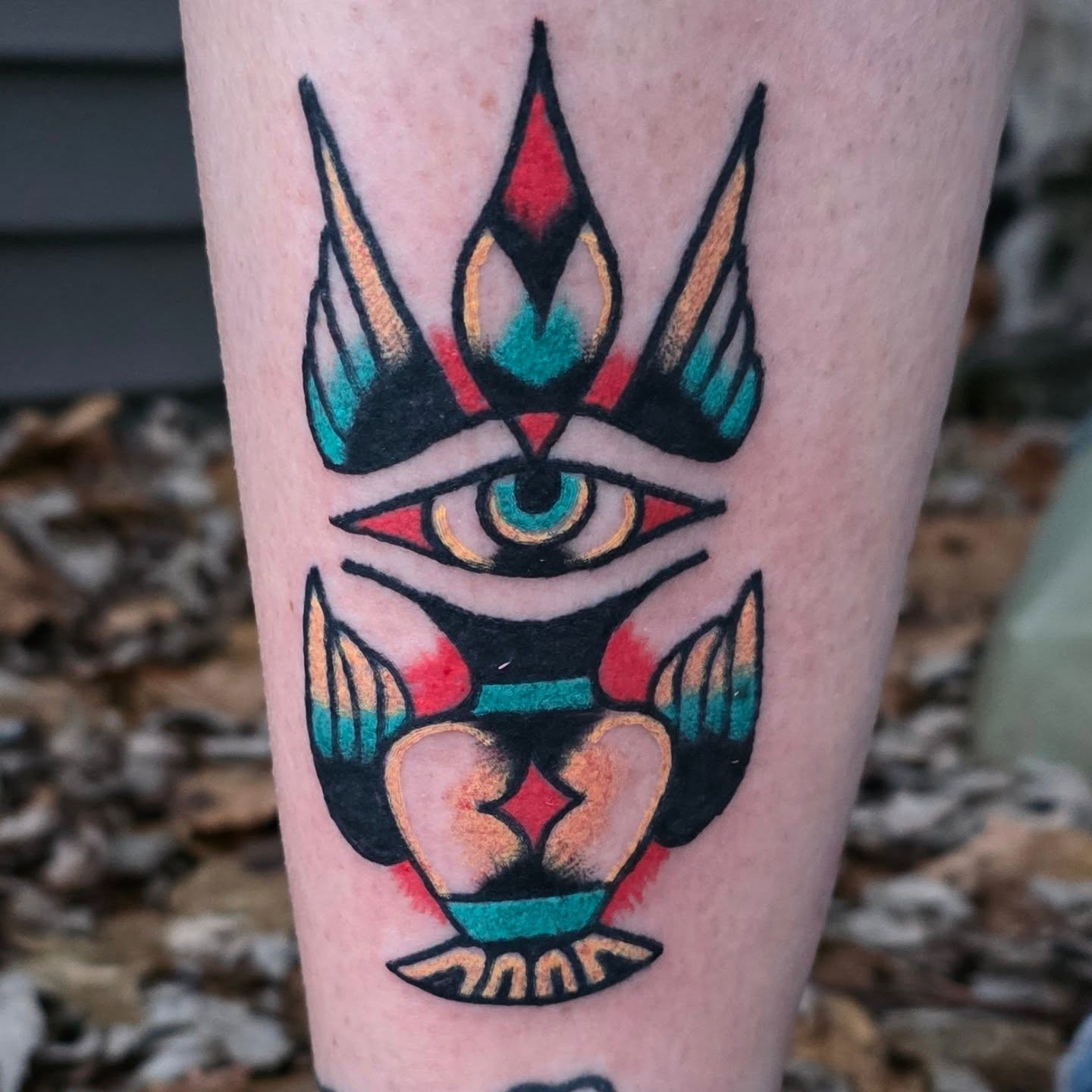 Eye and crown American traditional tattoo on the forearm by Mitch Braver