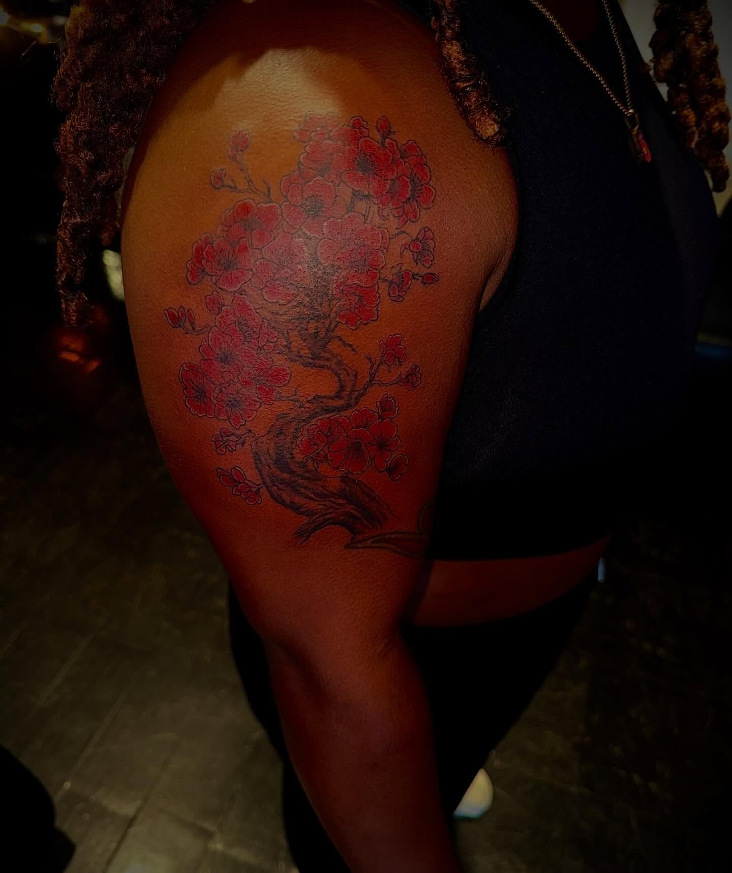 Cherry blossom tree dotwork tattoo on the thigh by Clifford Jordan