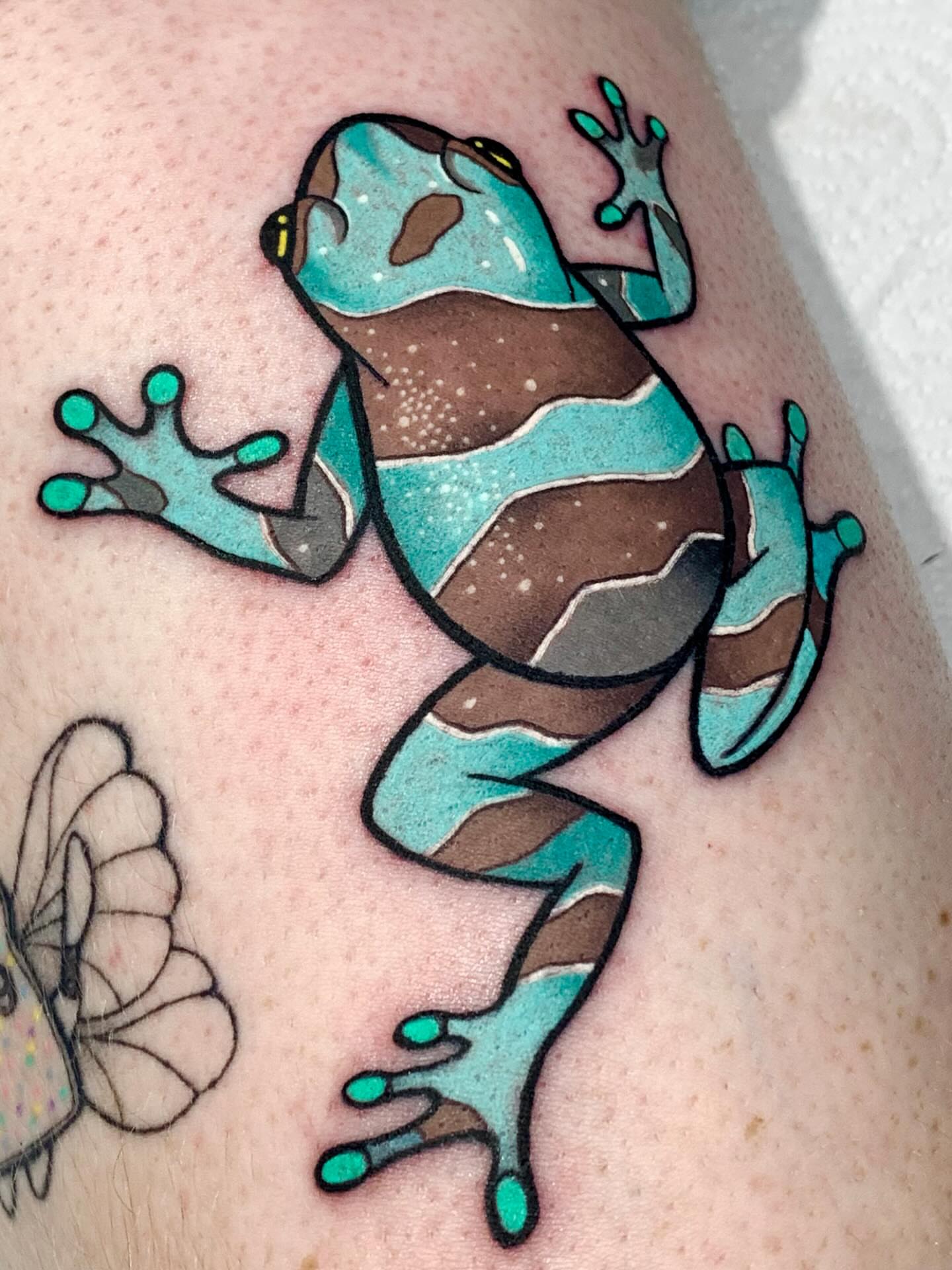 Frog new school tattoo on the forearm by hurjaesae