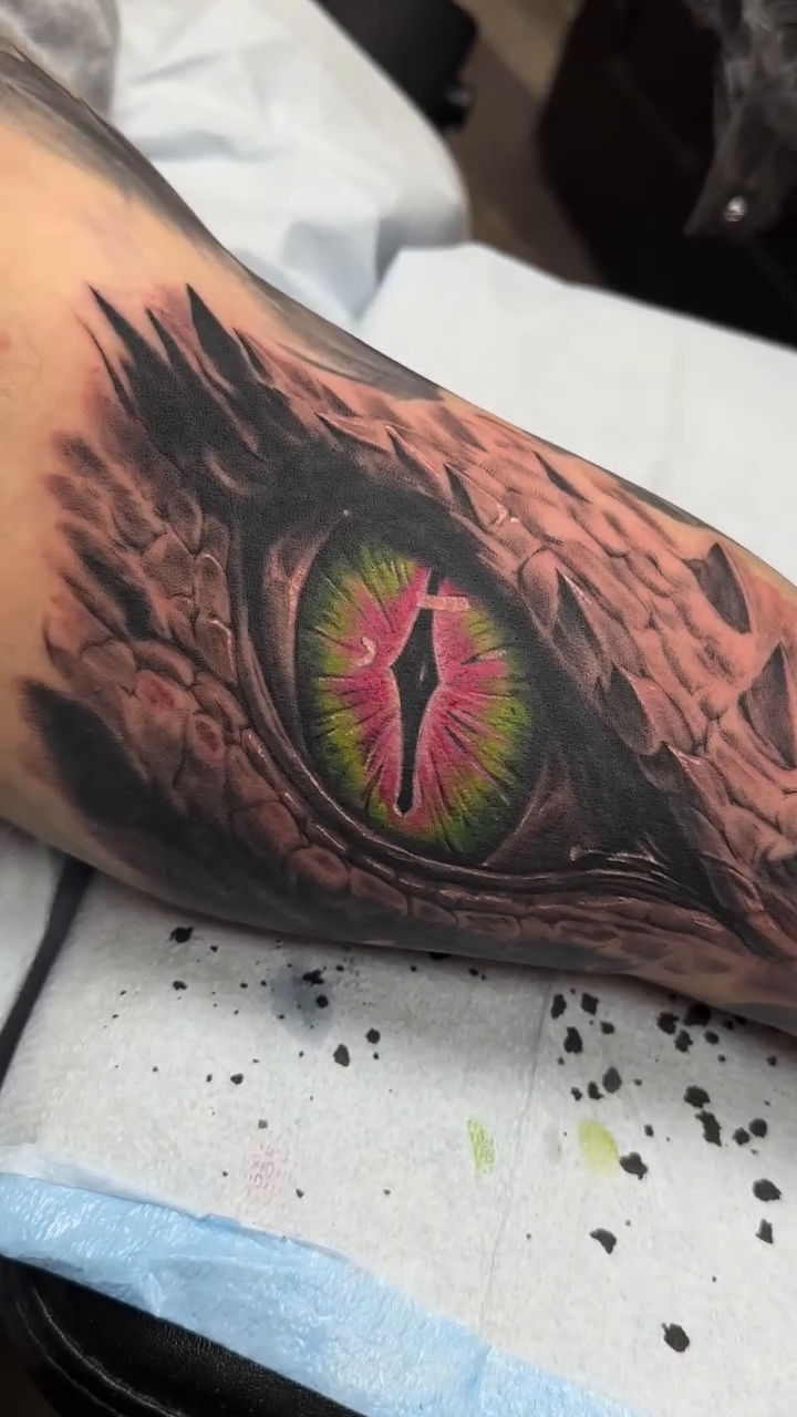 Dragon eye realism tattoo by Matthew Doherty