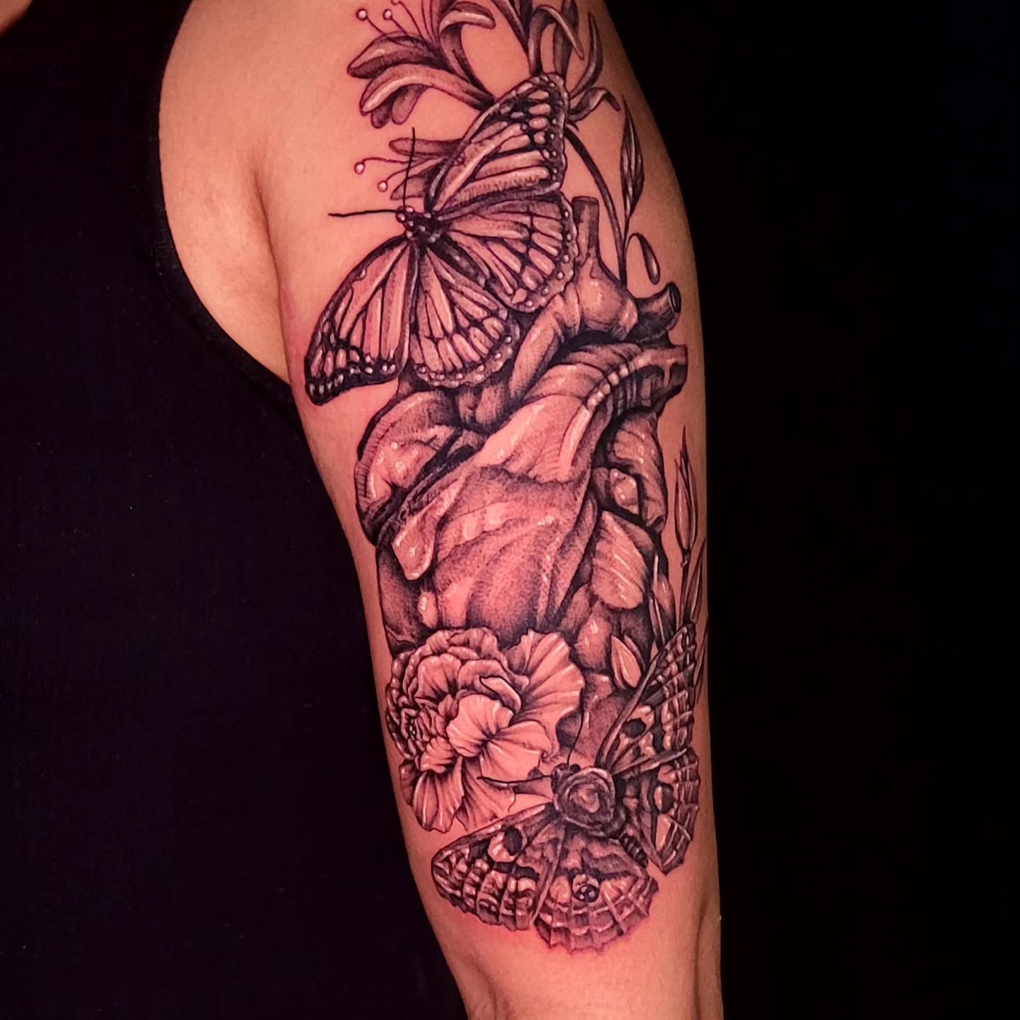 Tattoo by @rogue_stainedskin — realism, black_and_grey