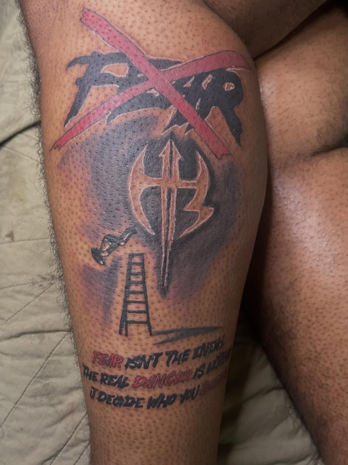 Crossed-out text with ladder and figure dotwork tattoo on the thigh by Illuminink.gallery