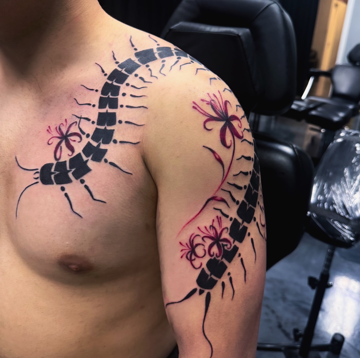 Centipede geometric tattoo on the shoulder by Marie Amor🌙