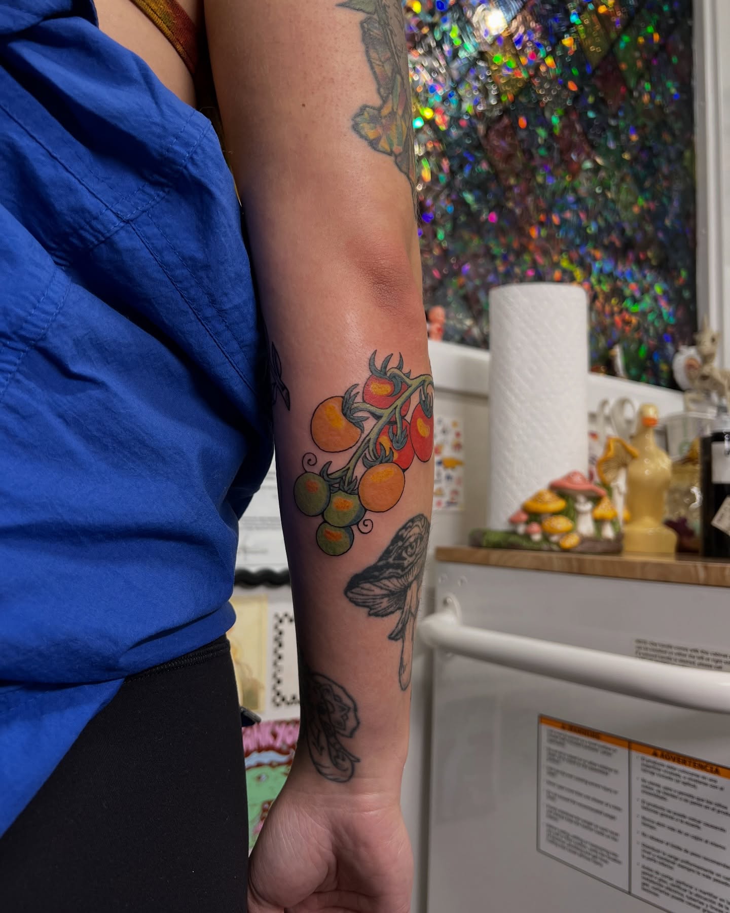 Tomato plant dotwork tattoo on the forearm by rachel