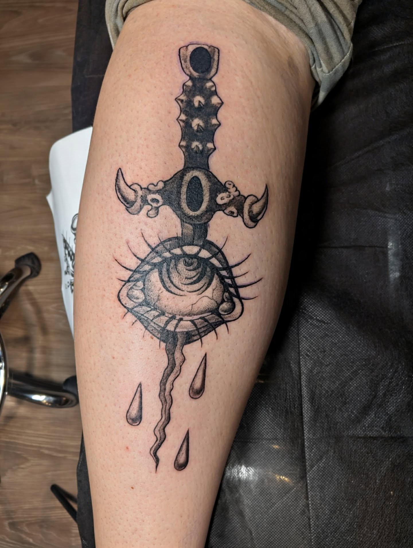 Eye and dagger dotwork tattoo on the thigh by Jo Xylo - Minneapolis Tattoo Artist, Minneapolis, Minnesota