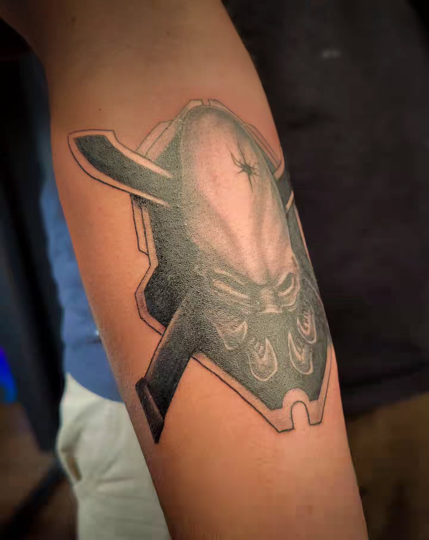 Skull black and grey tattoo on the forearm by Jesse TheTerrible