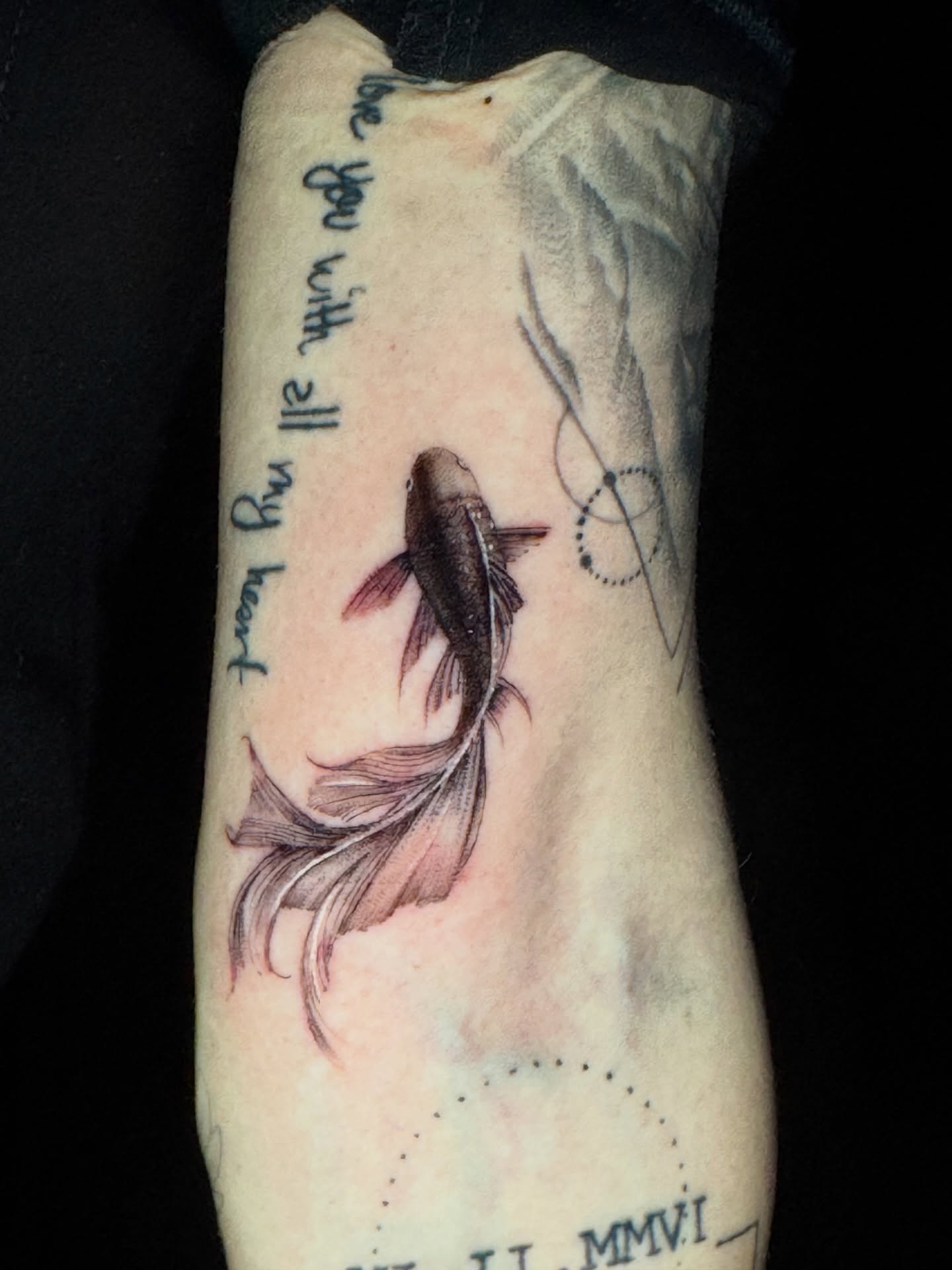 Fish realism tattoo on the forearm by North County Sd