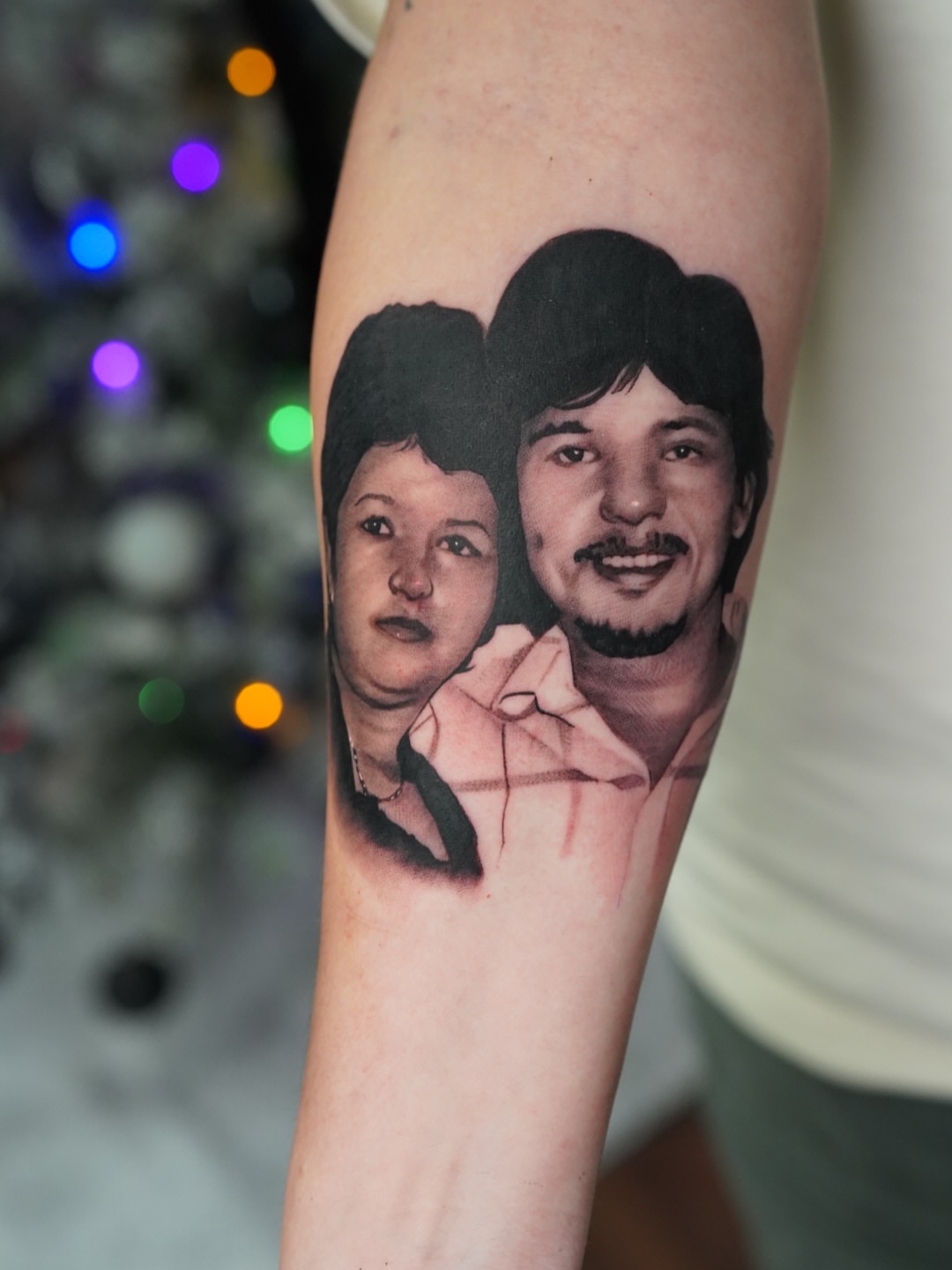 Portrait realism tattoo on the forearm by Luis Rodriguez