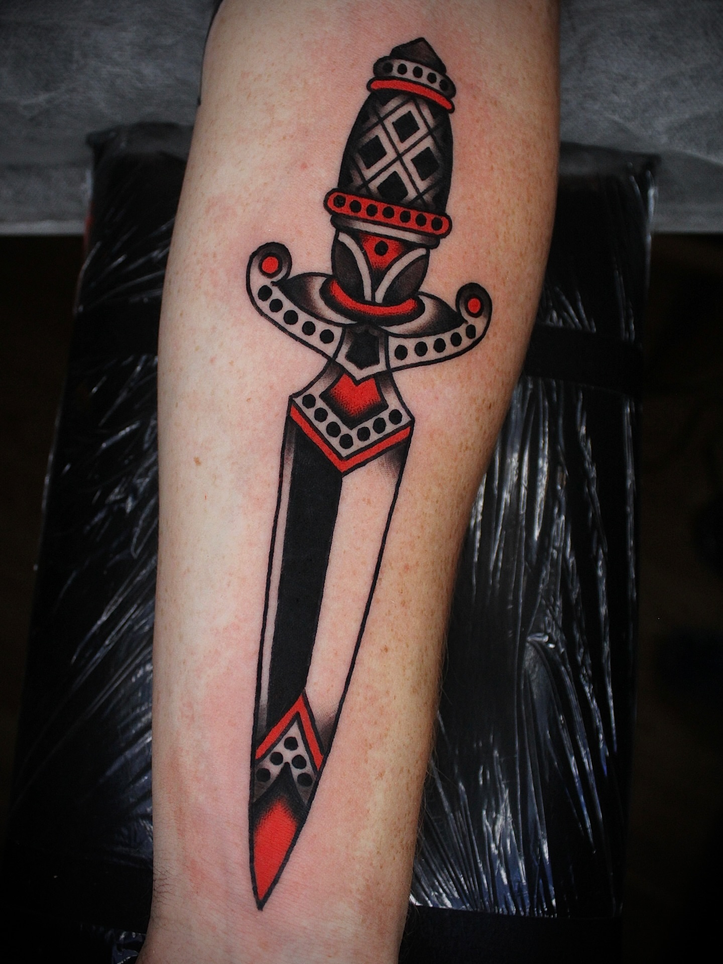 Dagger American traditional tattoo on the forearm by Dustin Stemen, Charlotte, North Carolina