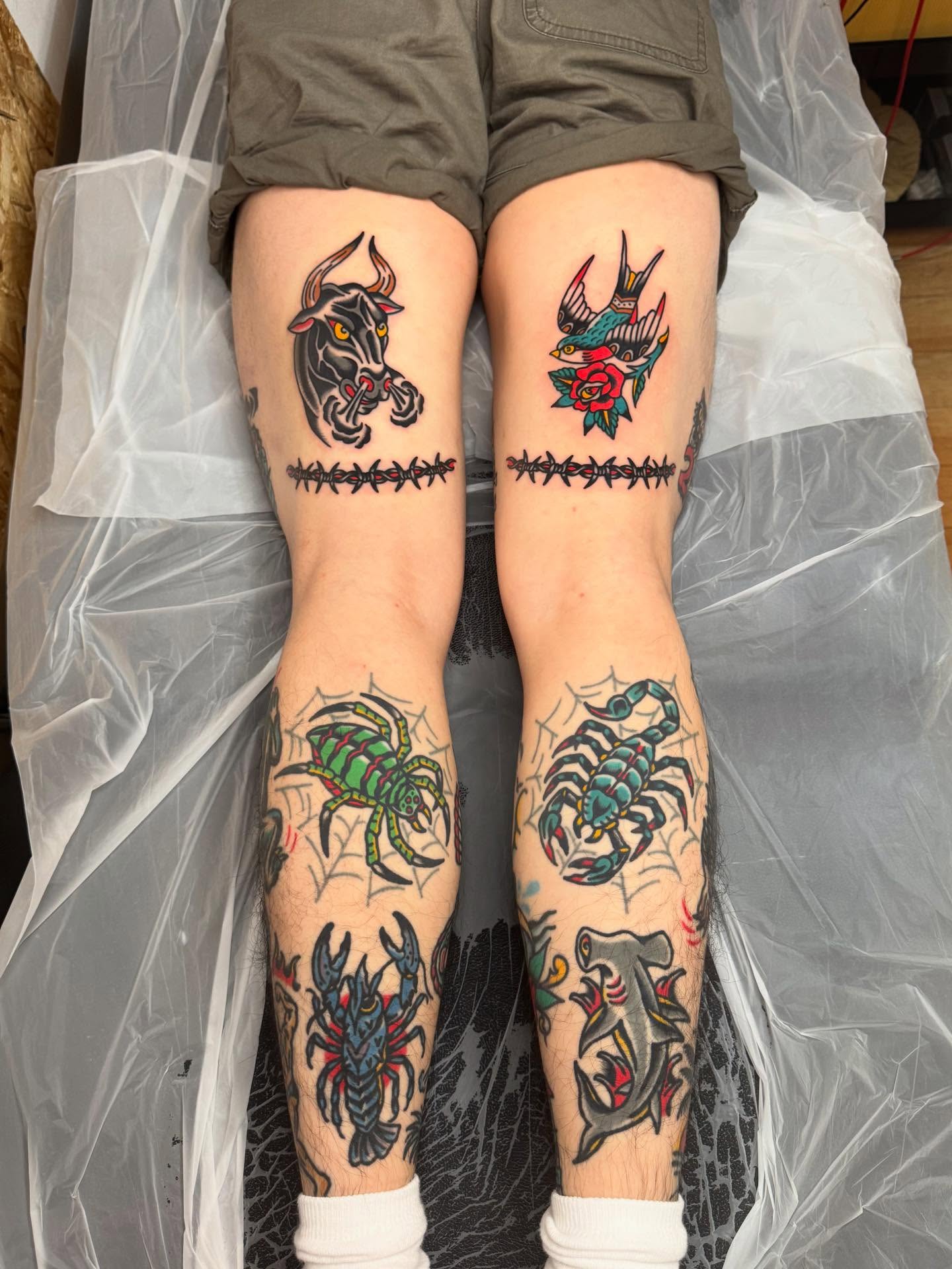 Bull, swallow, scorpion, crab, shark American traditional tattoo on the leg by Oldschool Tattooer