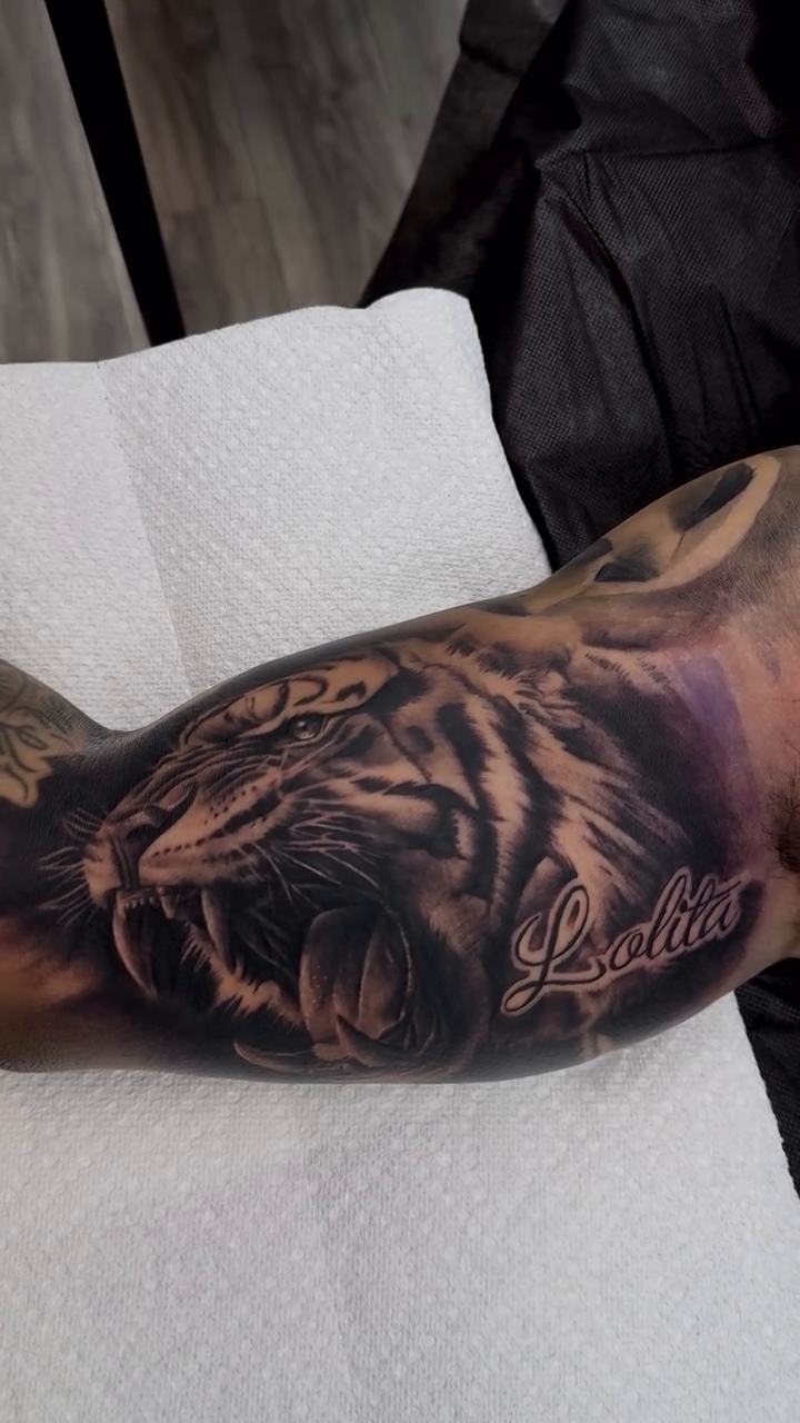 Tattoo by @alinas_tattoos β realism, black_and_grey