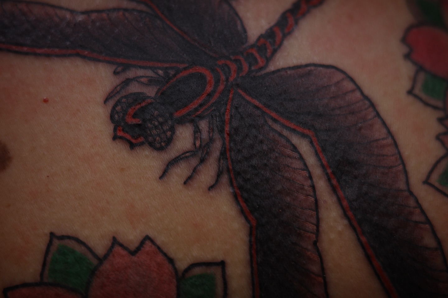 Scorpion American traditional tattoo on the torso by Innokenty Meshchakov, Portland, Oregon