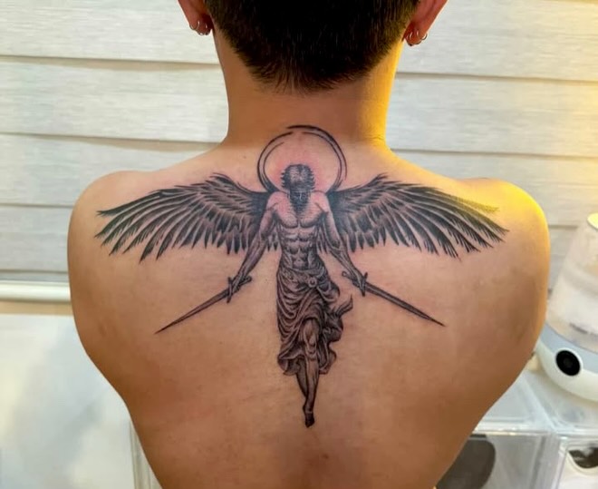 Angel with swords black and grey tattoo on the back by Gerd thINK_TATTOO