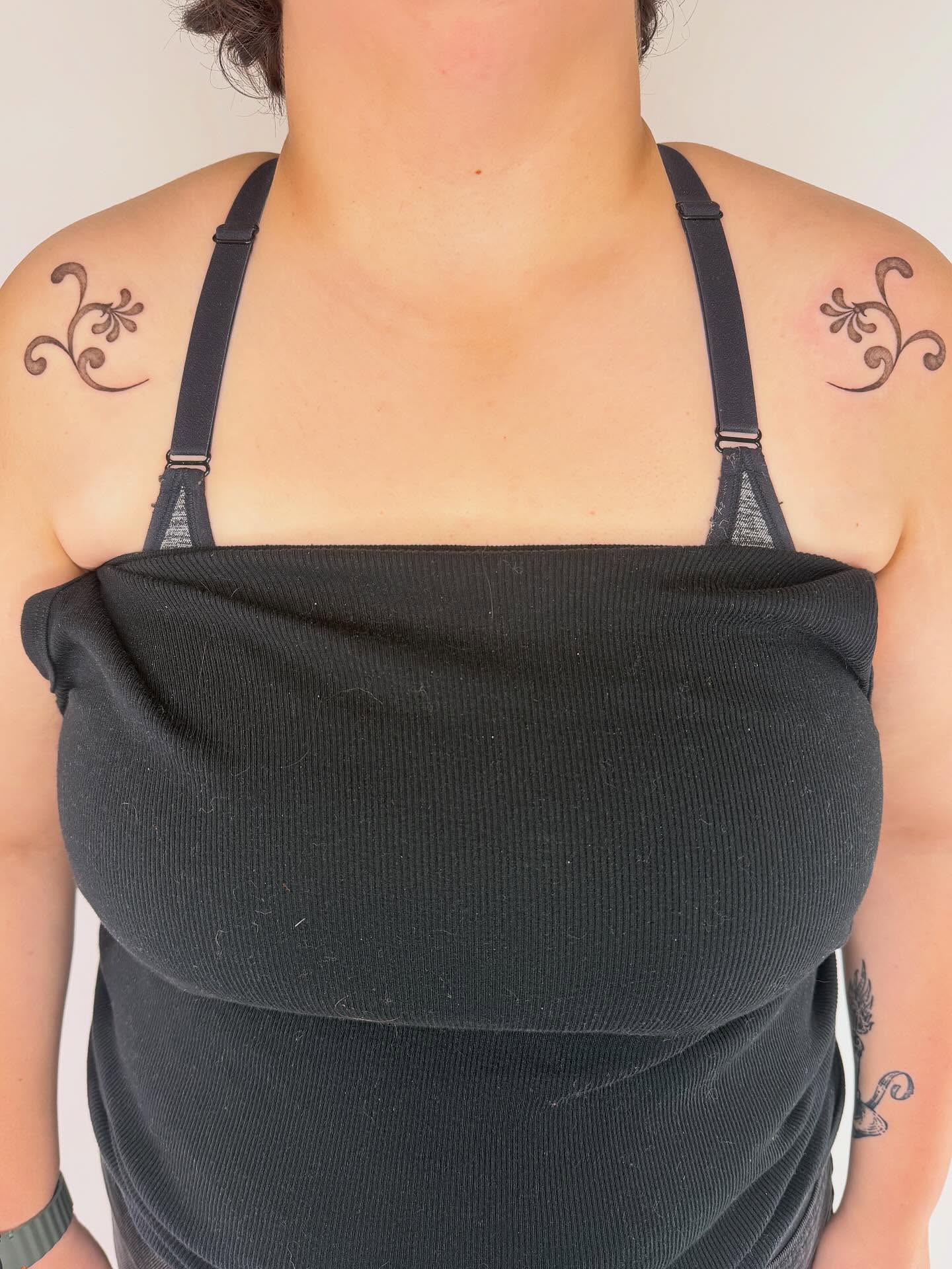 Scrollwork black and grey tattoo on the shoulder by Leah Ramos