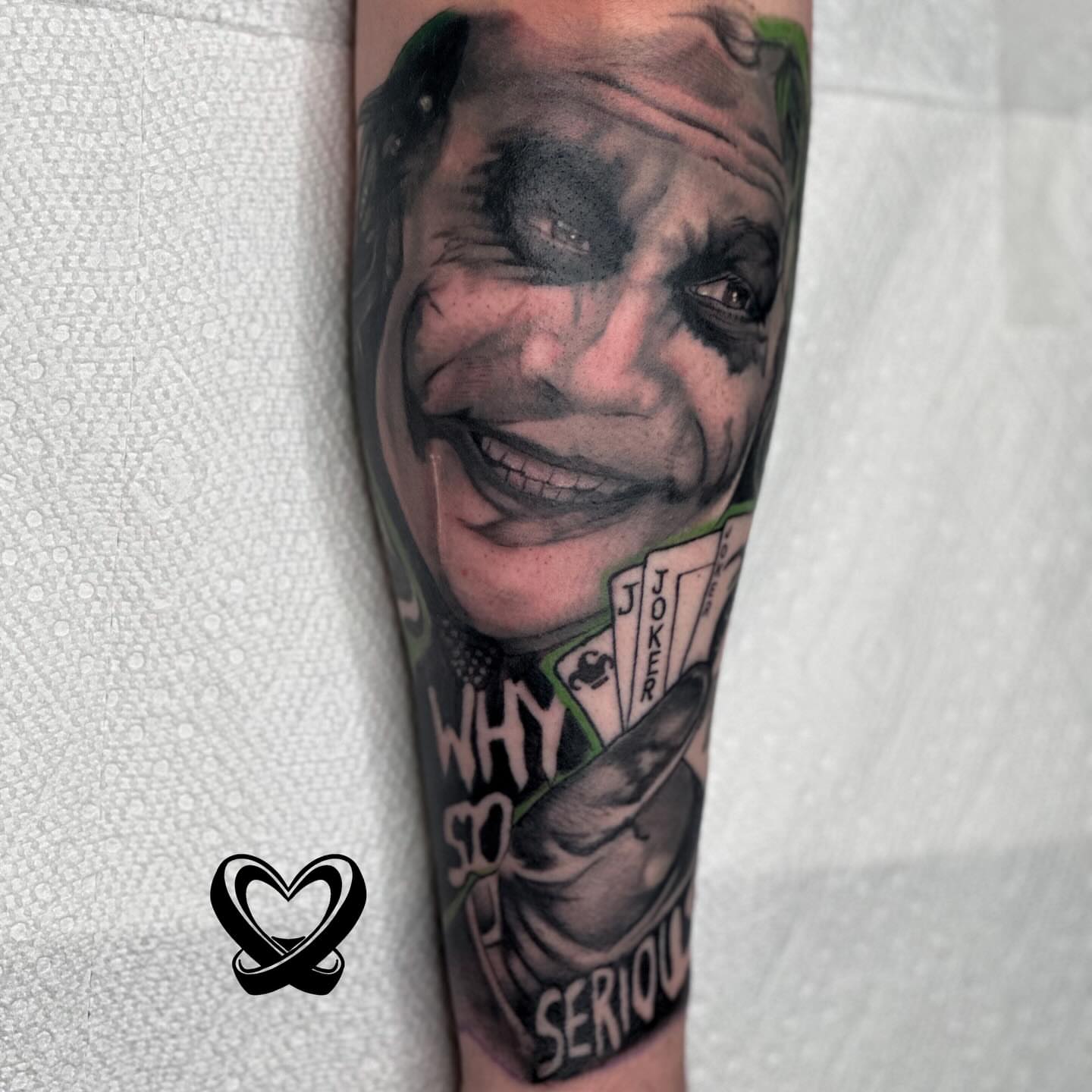 Joker realism tattoo on the forearm by Keyon J