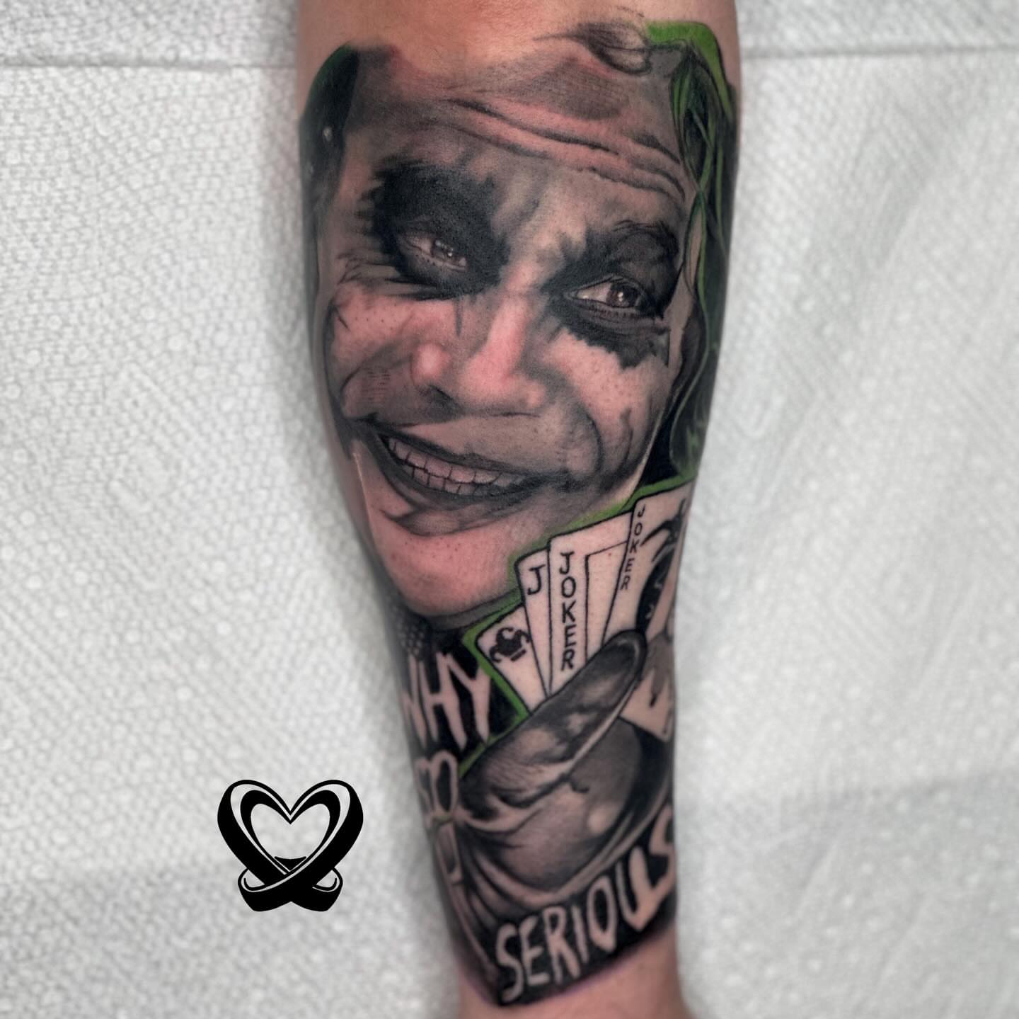 Joker realism tattoo on the forearm by Keyon J