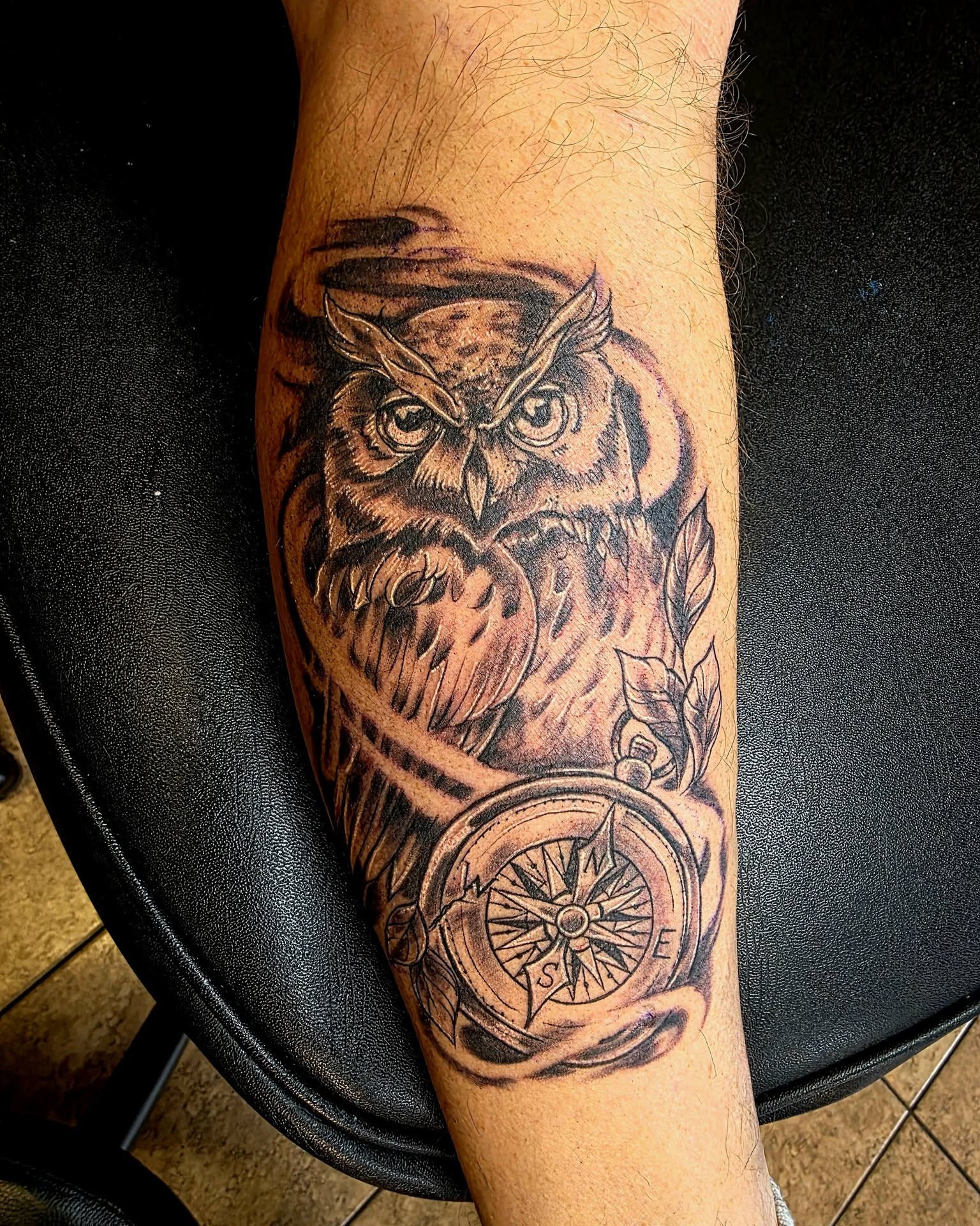 Owl and compass realism tattoo on the forearm by Jessica DarkRabbit