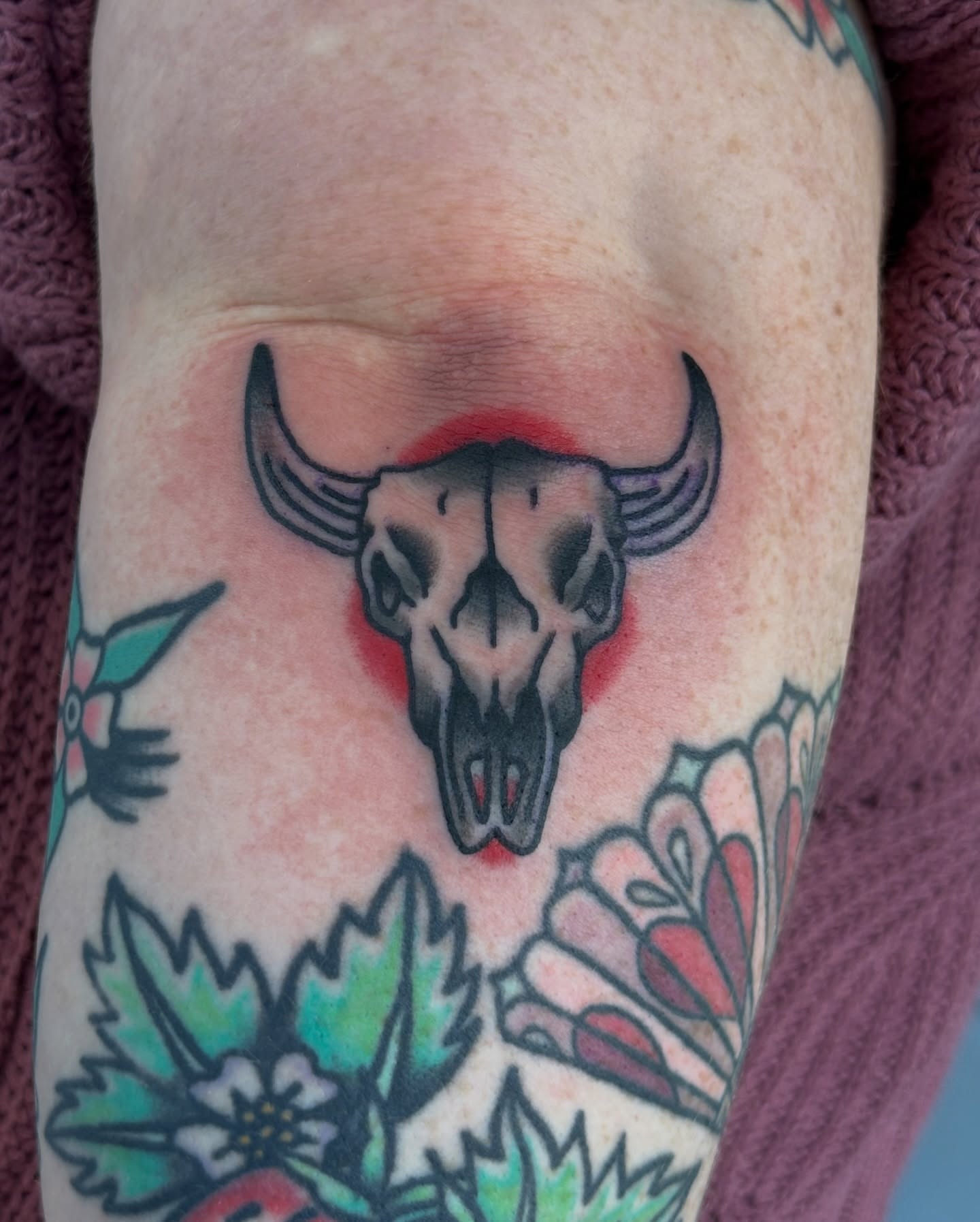 Bull skull American traditional tattoo on the forearm by Michael Williams