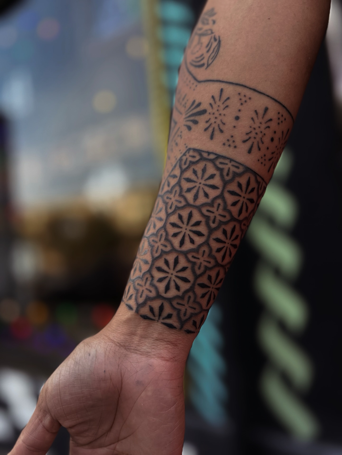 Geometric pattern geometric tattoo on the forearm by Storm Smith