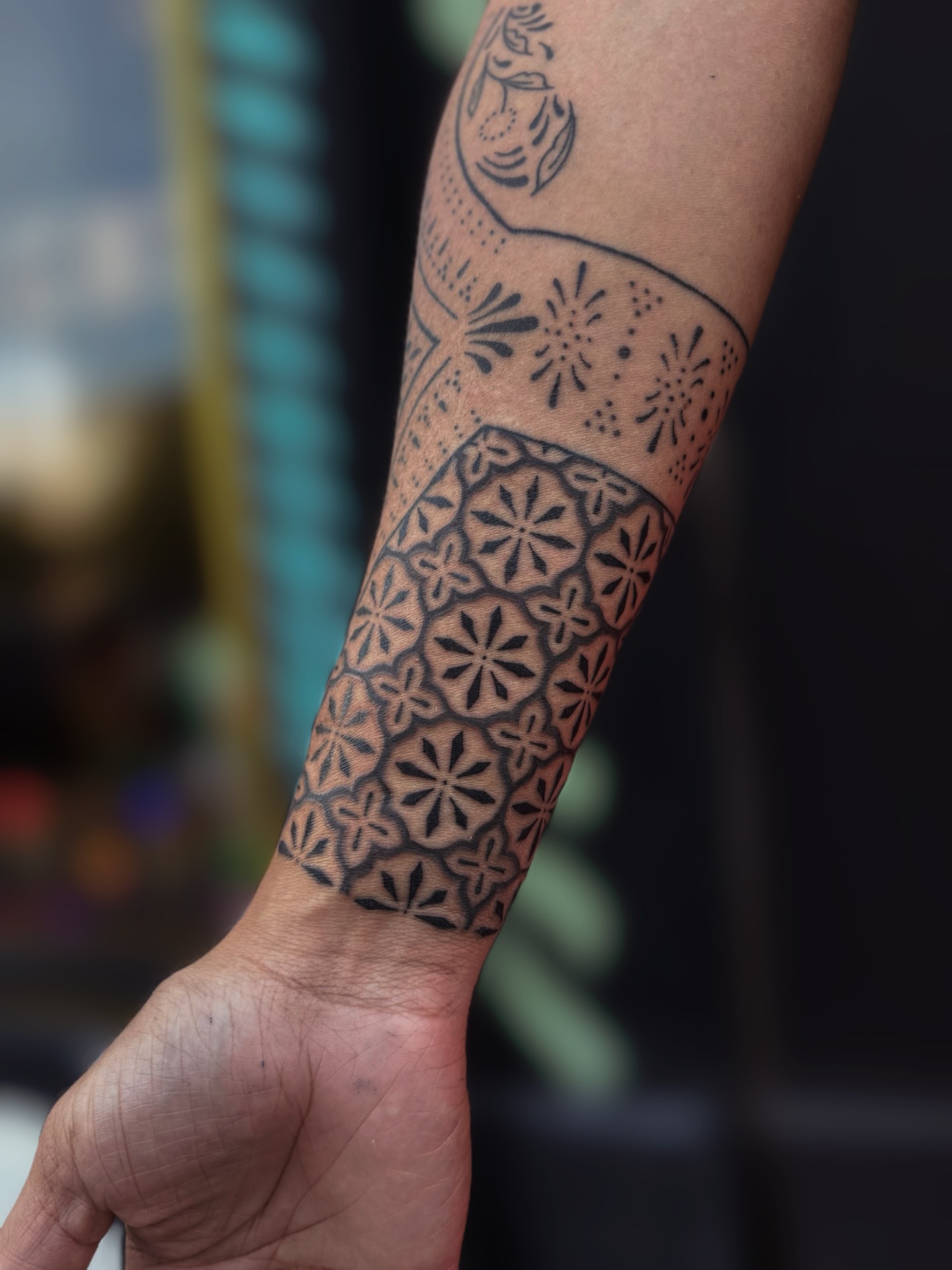 Geometric pattern geometric tattoo on the forearm by Storm Smith