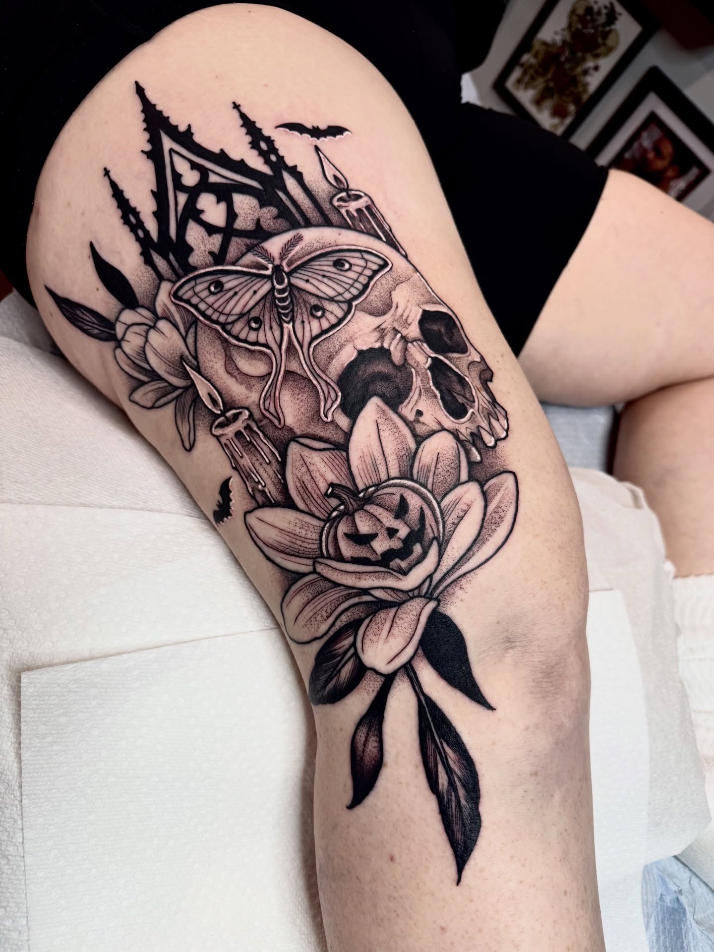 Skull and flowers realism tattoo on the thigh by ⚡️ Krissy Fabis ⚡️