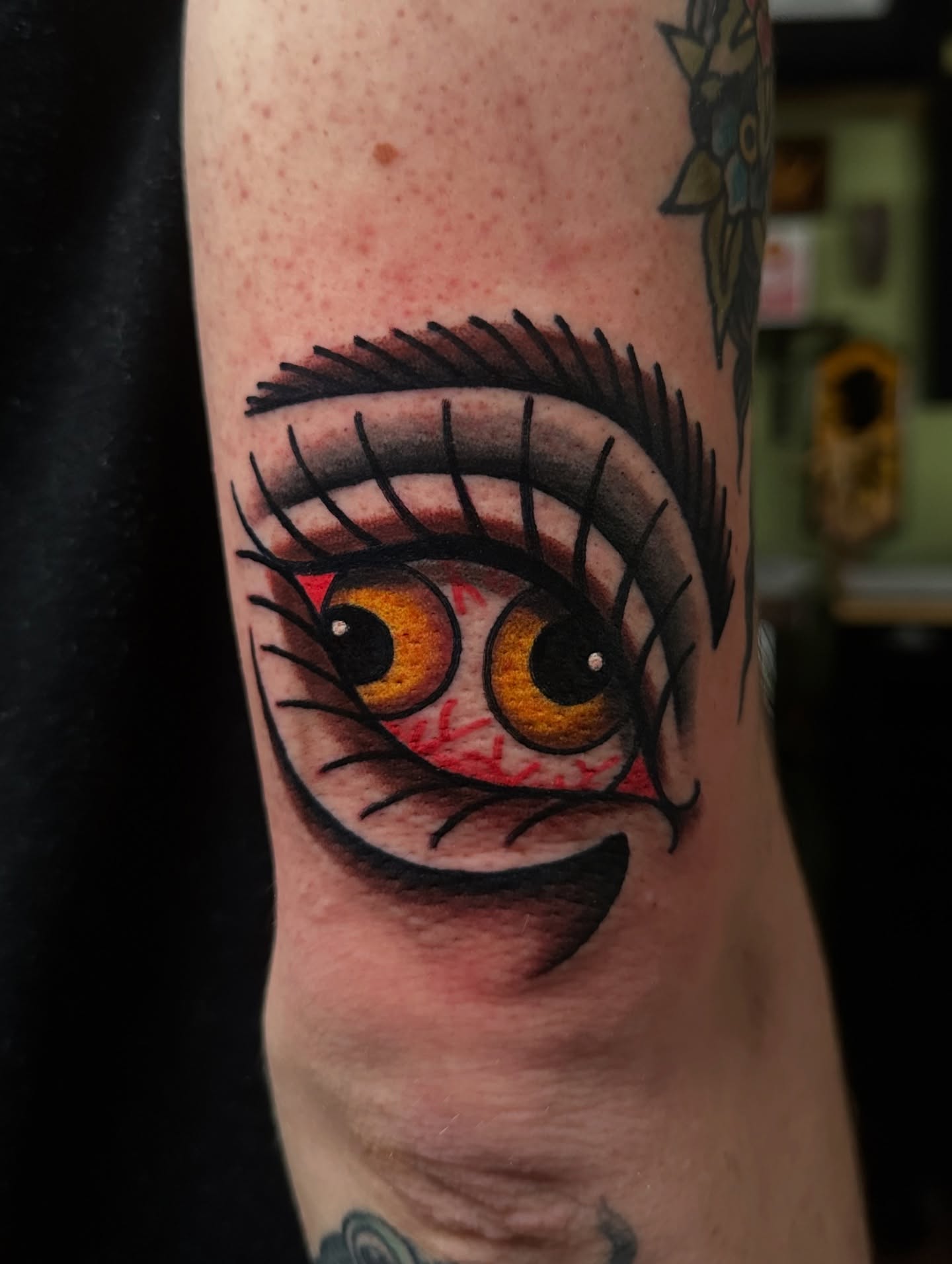 Eye realism tattoo on the forearm by Trevor Burtz