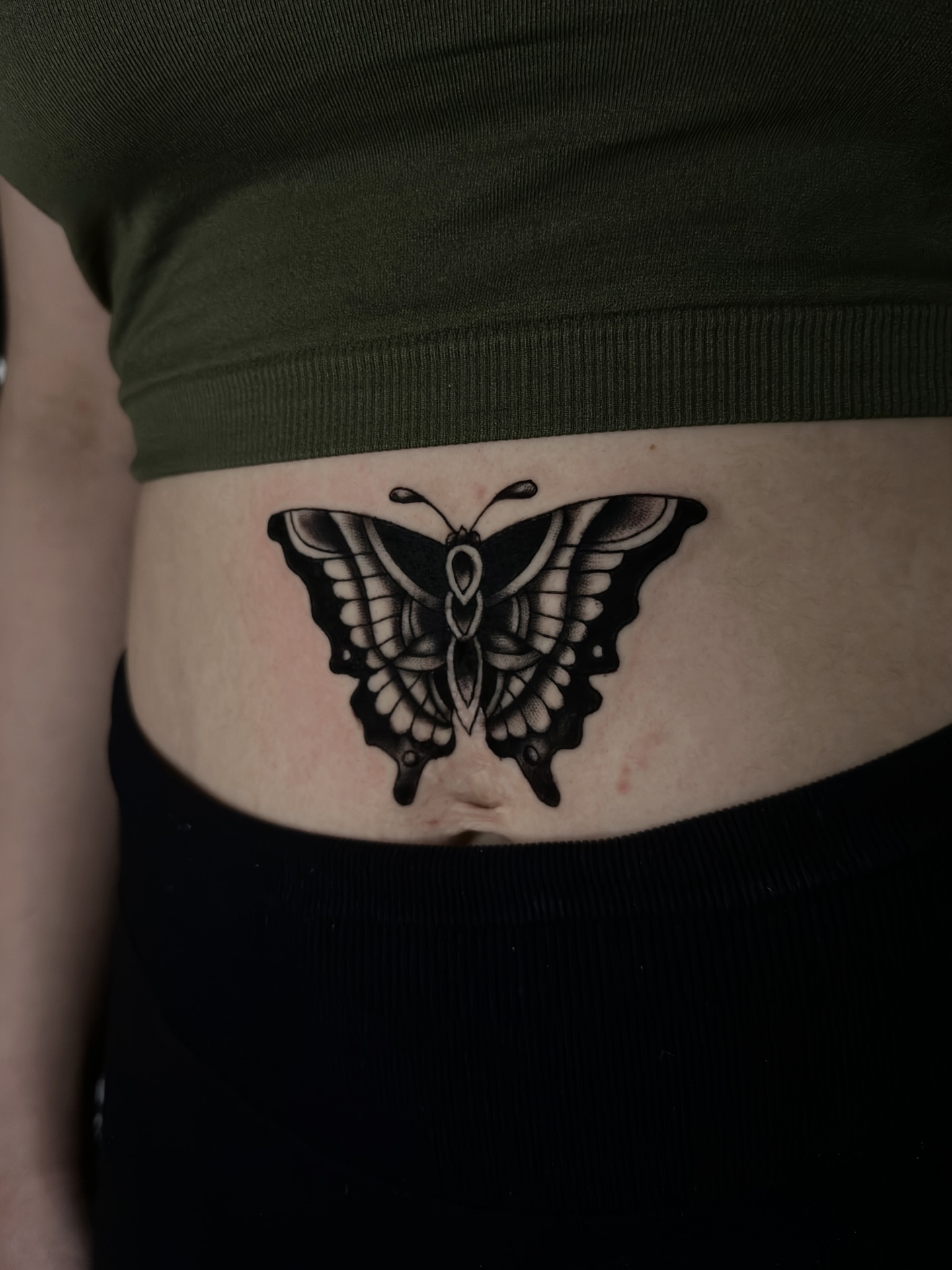Butterfly black and grey tattoo on the torso by Messias Tattoo Artist