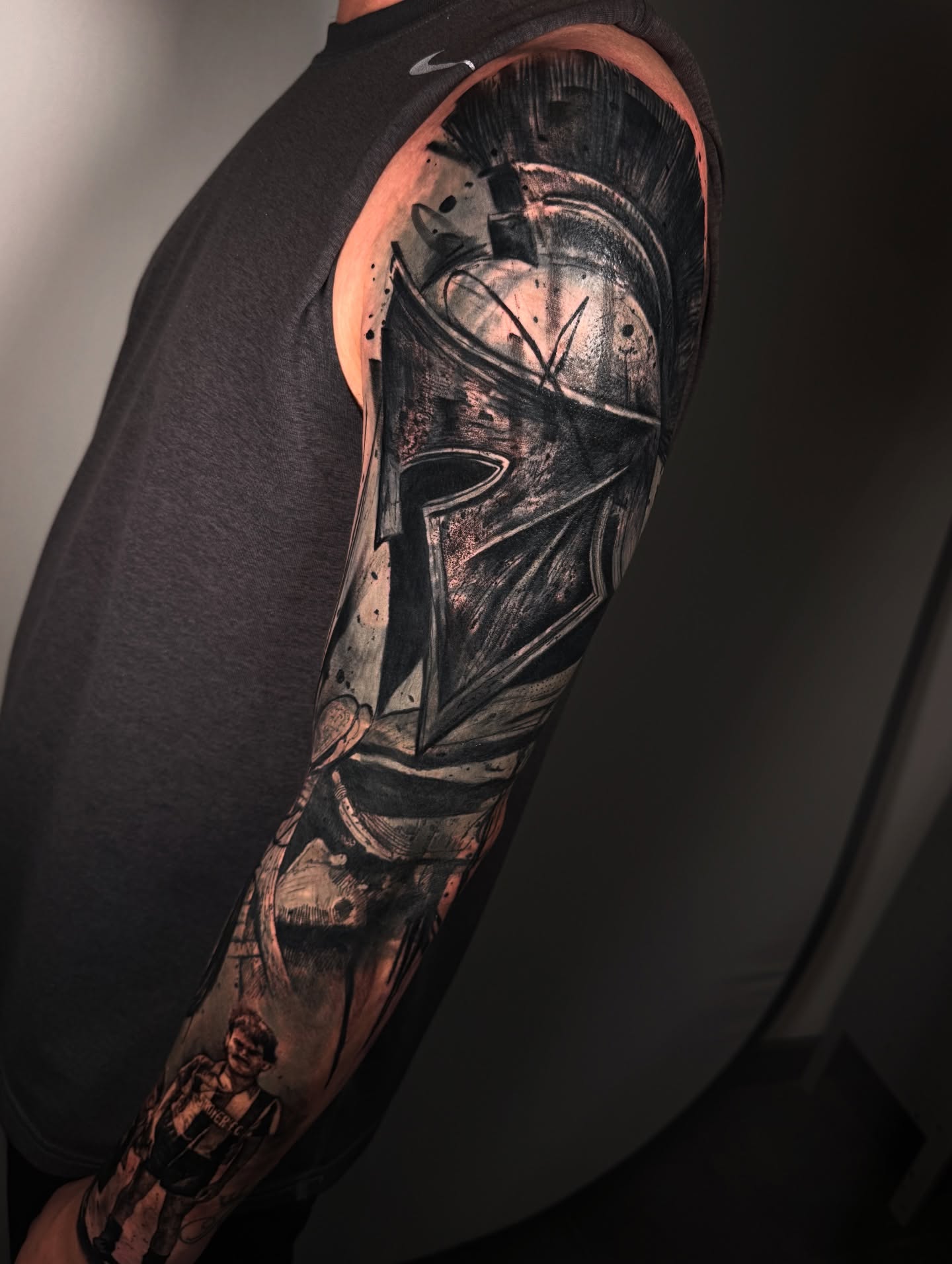 Spartan helmet realism tattoo on the forearm by Georgios Papadopoulos Tattoo Artist Los