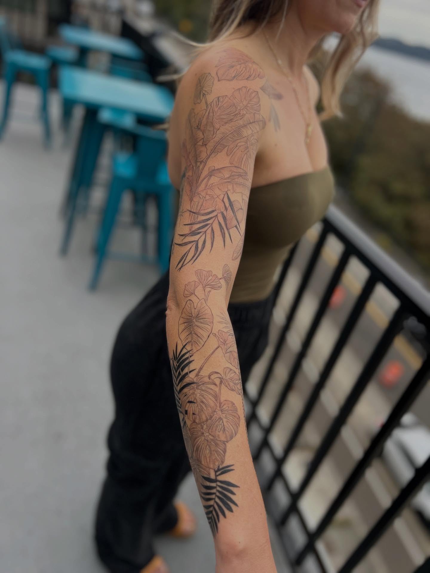 Botanical black and grey tattoo on the upper arm by Jordi WA Tacoma Tattooer