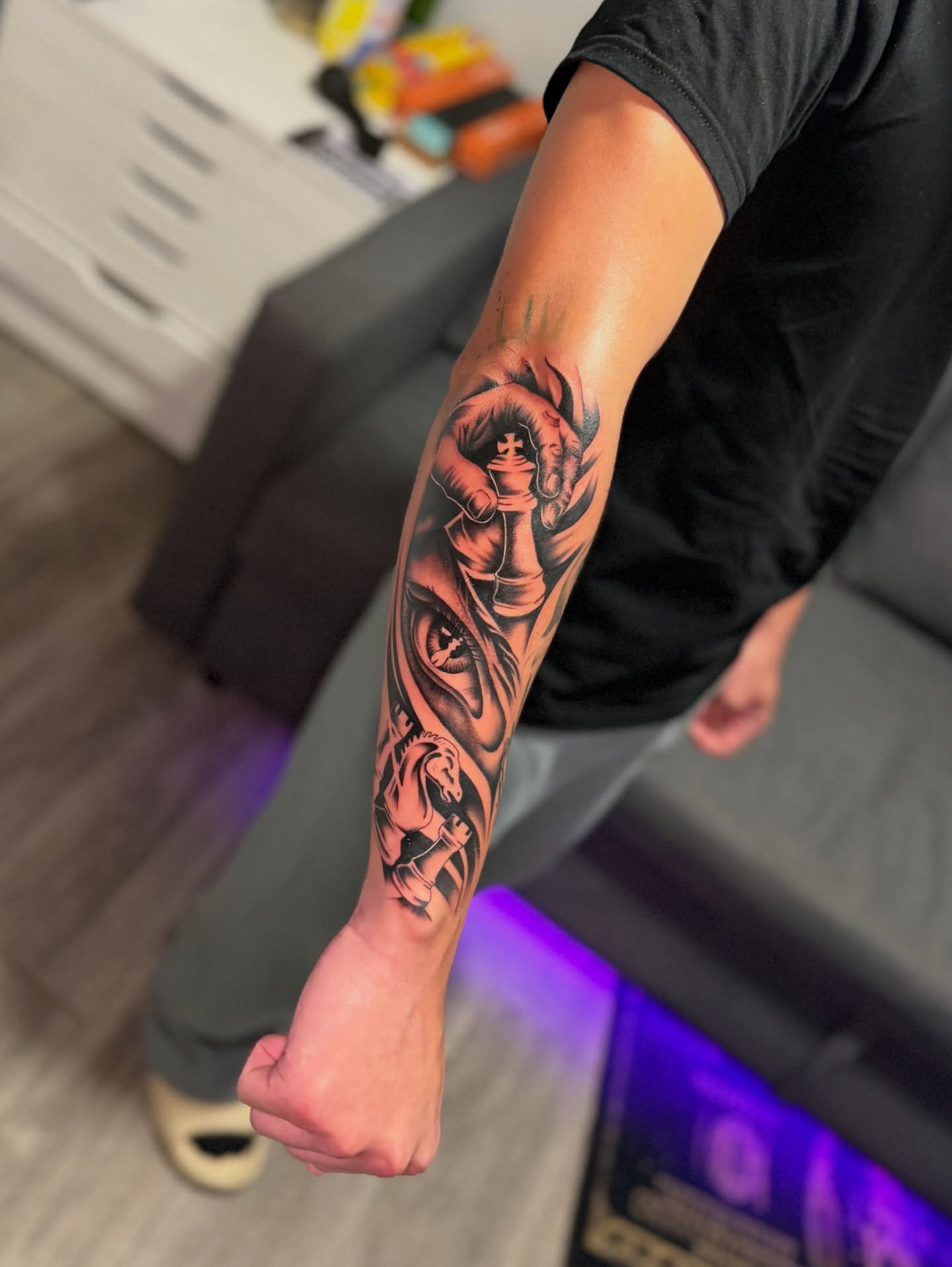 Eye and lion realism tattoo on the forearm by InkbyCasillas