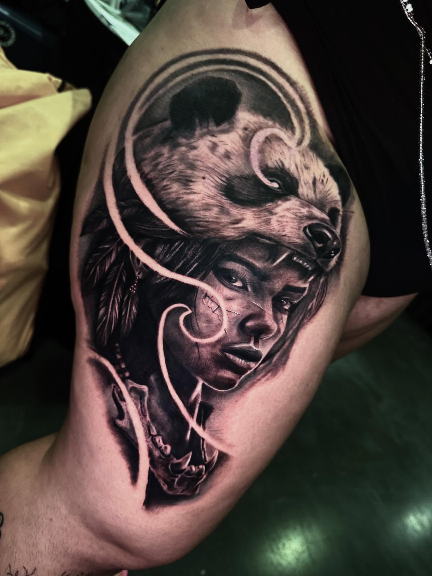 Woman with wolf realism tattoo on the shoulder by Levi Tattoo Artist, Utah