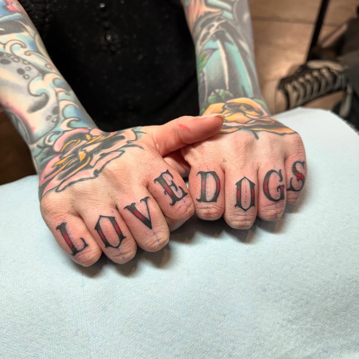 LOVEDOGS American traditional tattoo on the hand by Tony Medellin 7X9X