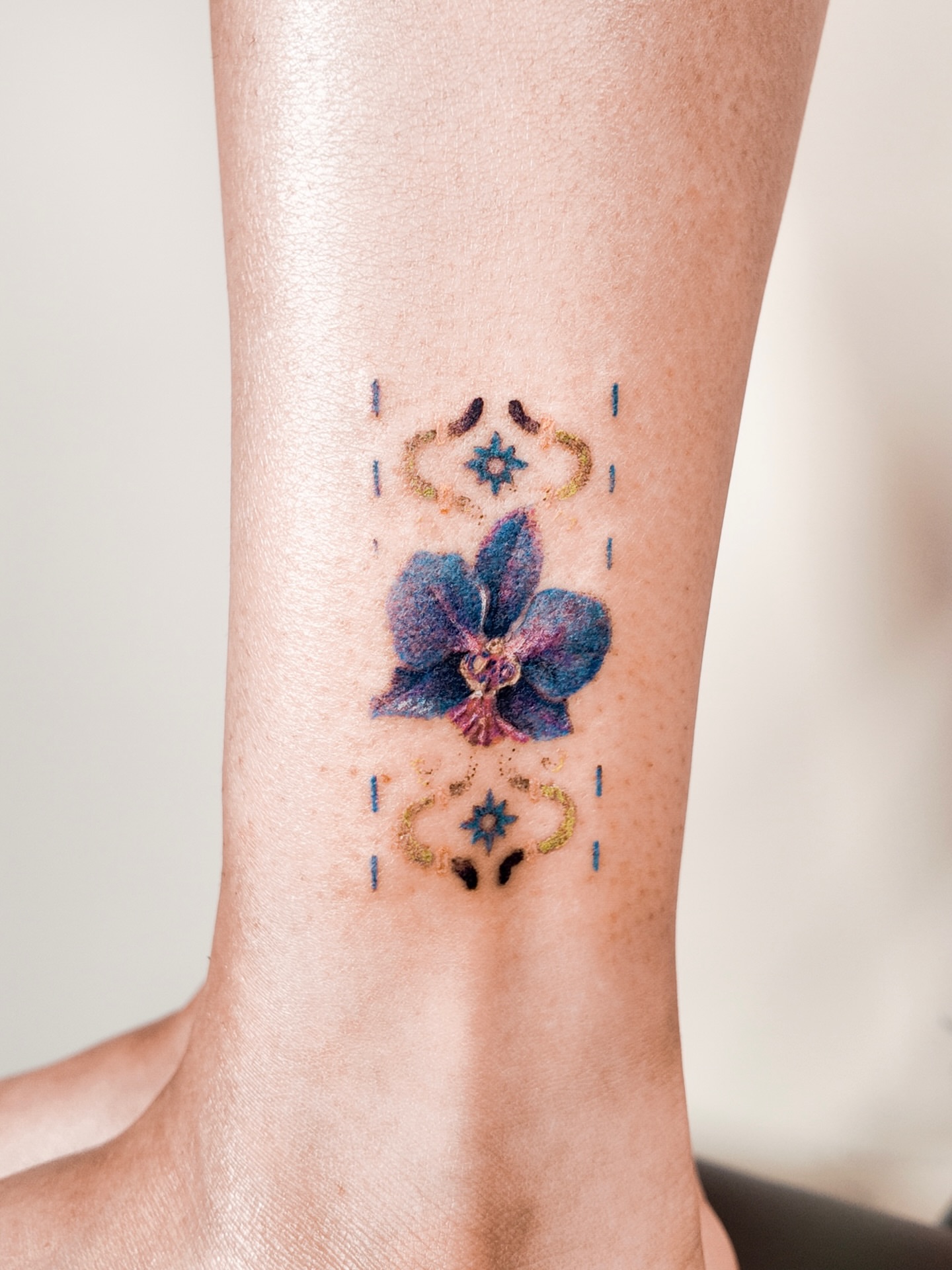 Tattoo by @miikasche — watercolor, geometric