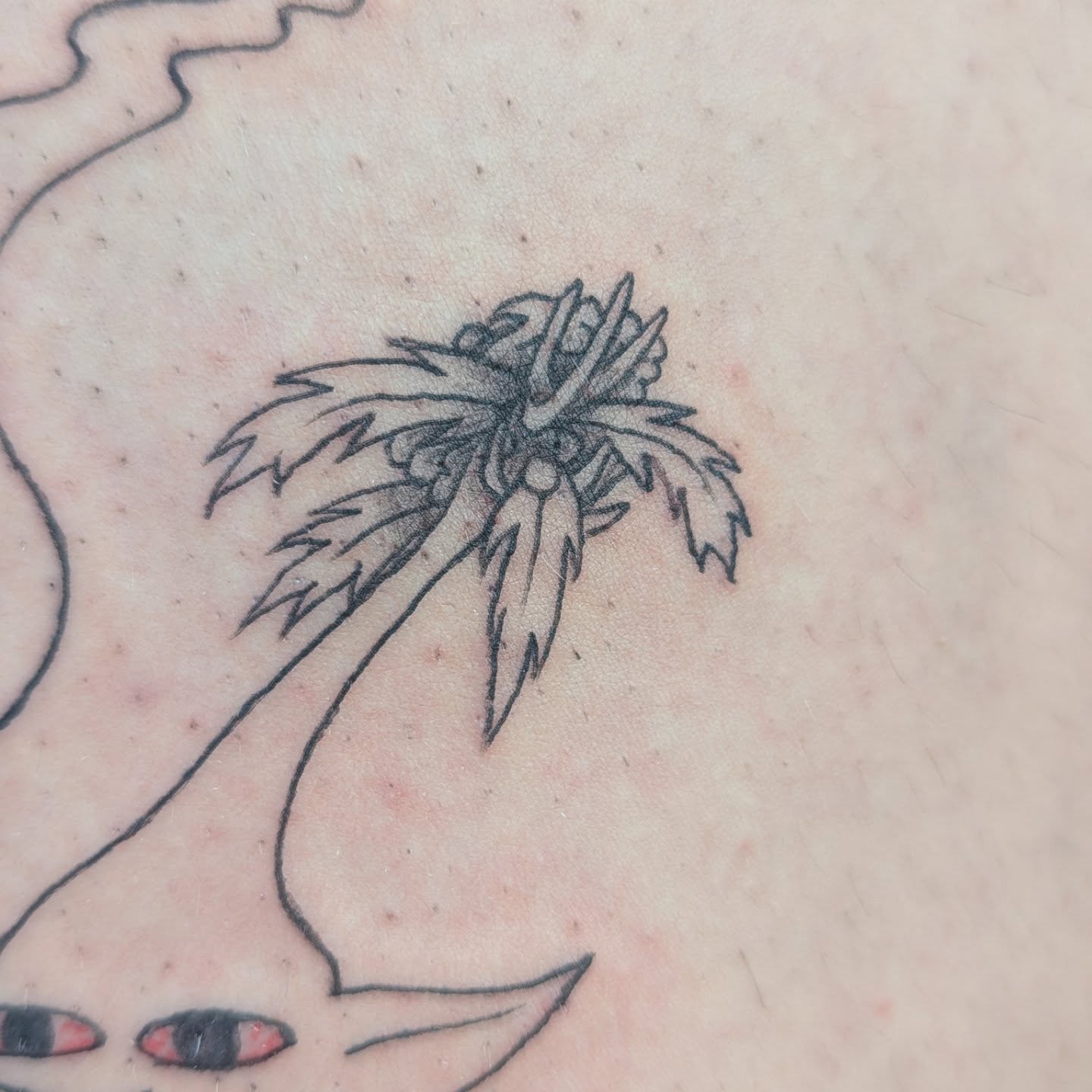 Palm tree black and grey tattoo on the chest by Karson