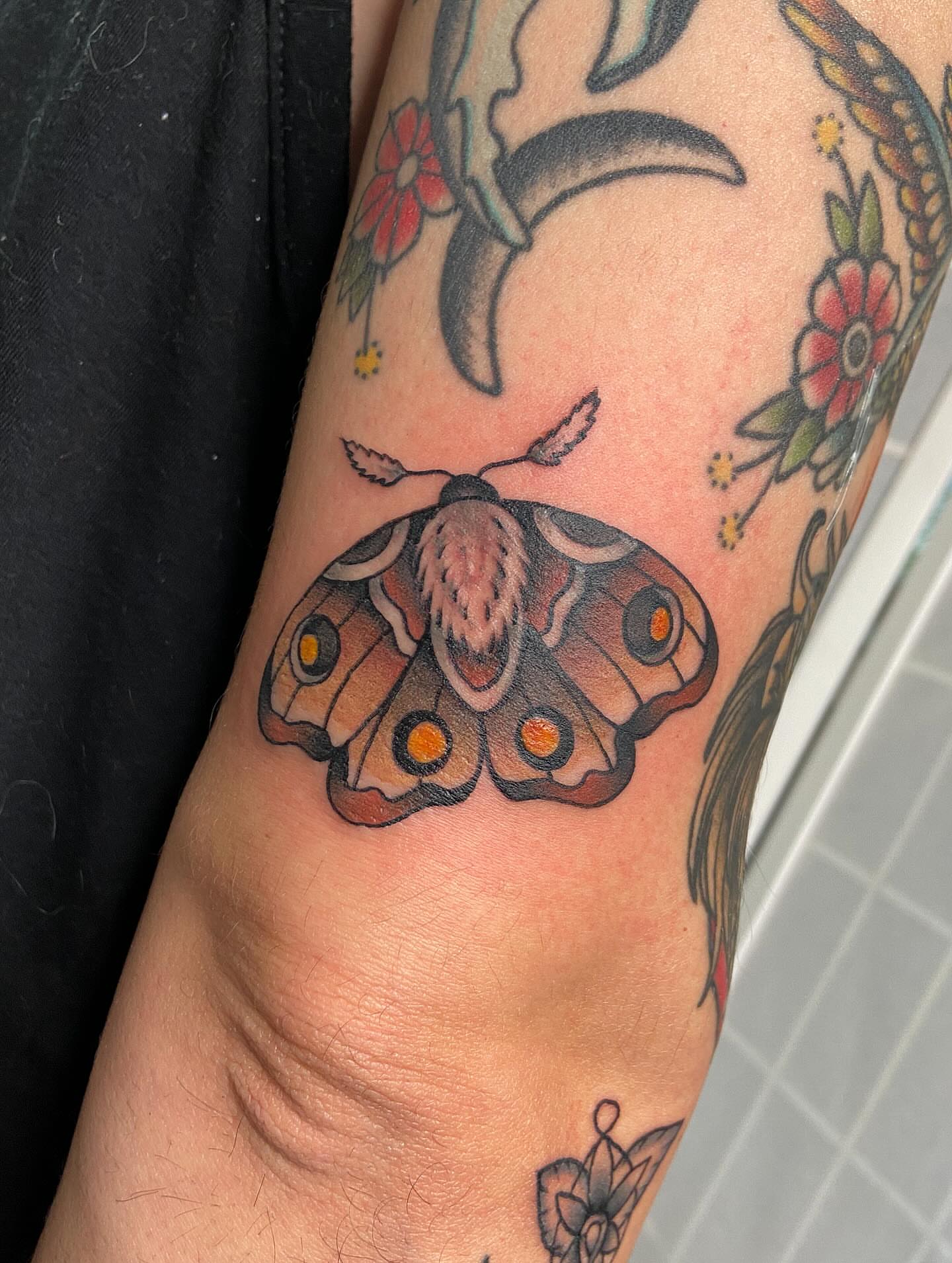 Butterfly American traditional tattoo on the forearm by Tattoos by Dale Hupke, Lebanon, Ohio