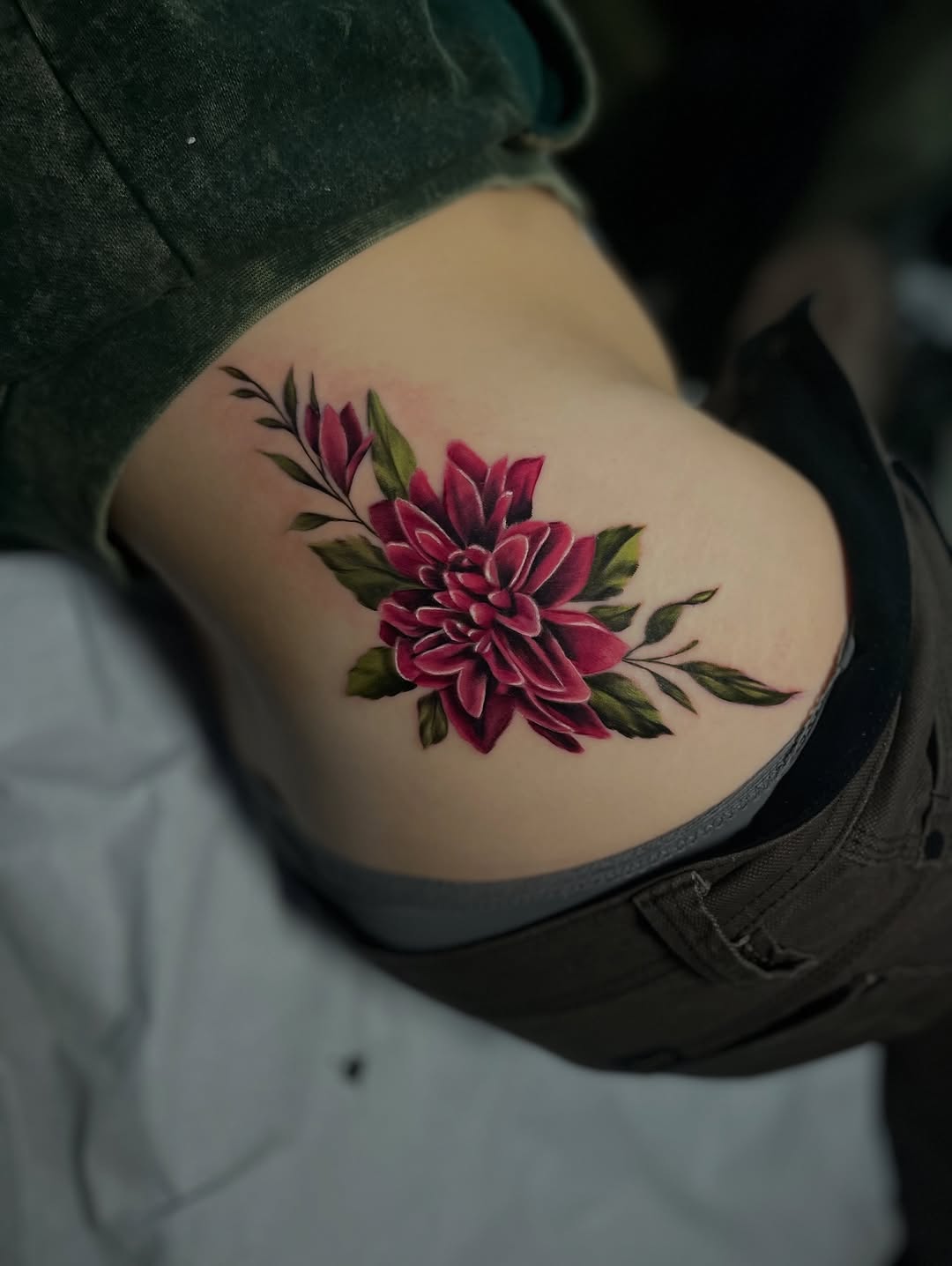Dahlia flower neo-traditional tattoo on the thigh by Brittany Welsh, Marlton, New Jersey