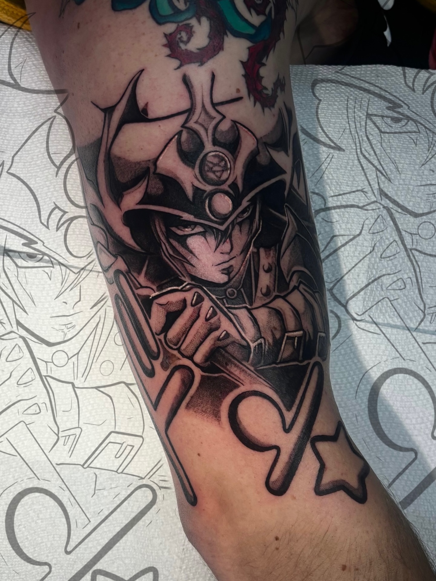 Tattoo by @owlliemoontattoo — anime, black_and_grey