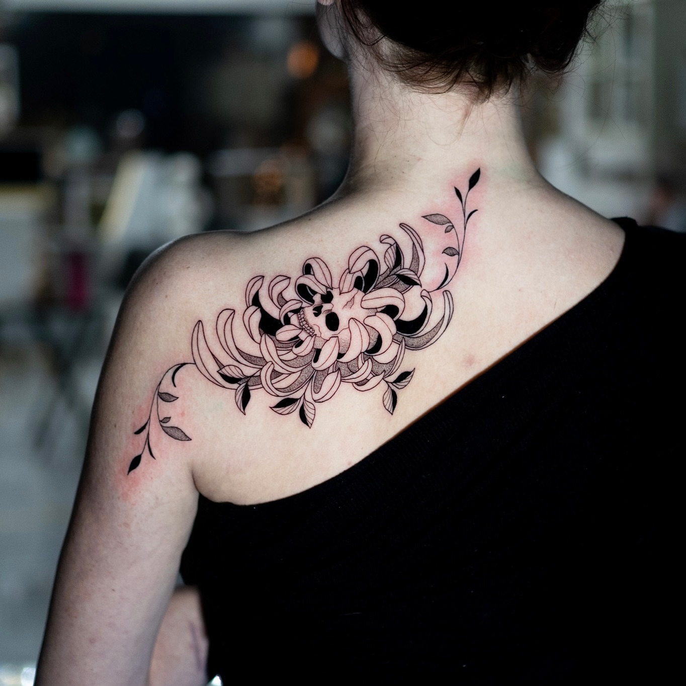 Floral design black and grey tattoo on the shoulder by Jorden Ruppe