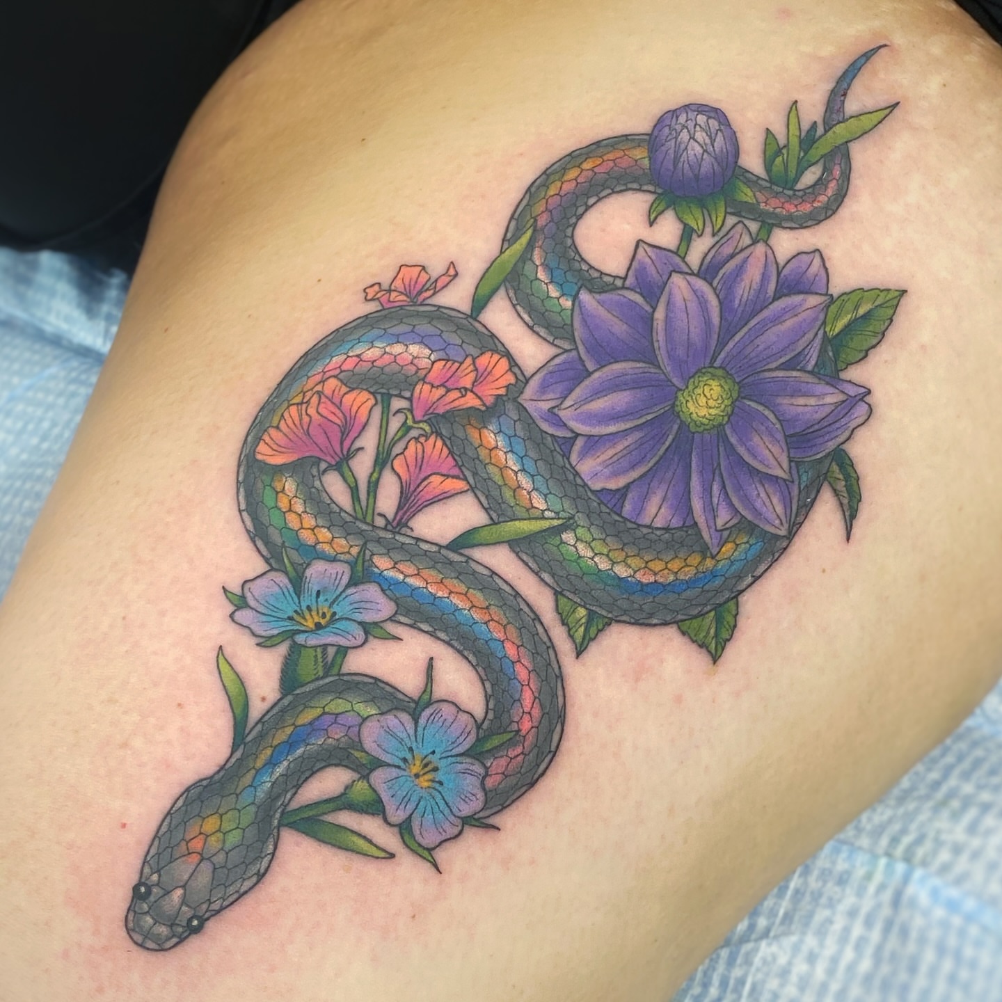 Snake and flowers new school tattoo on the thigh by Jeremy✨Sloo✨ Hamilton, Charlotte, North Carolina